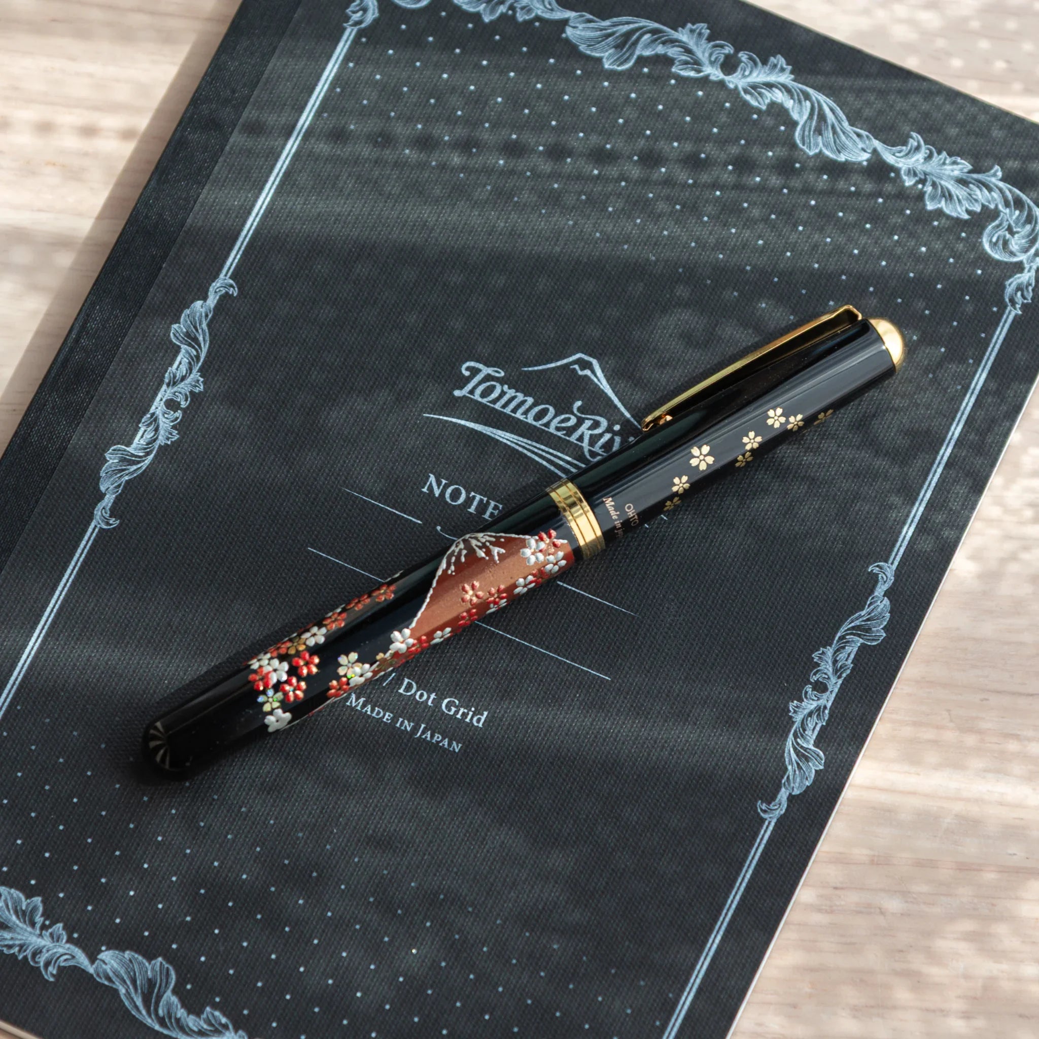 Fuji Sakura Yamanaka fountain pen displays hand-painted lacquer cherry blossom and mount detail for writing