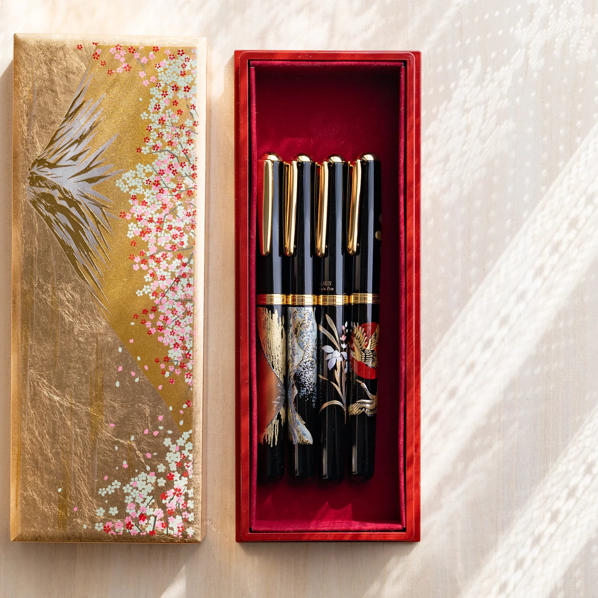 Gold decorated case flat lay on light surface showing surface relief design and texture shown in composition