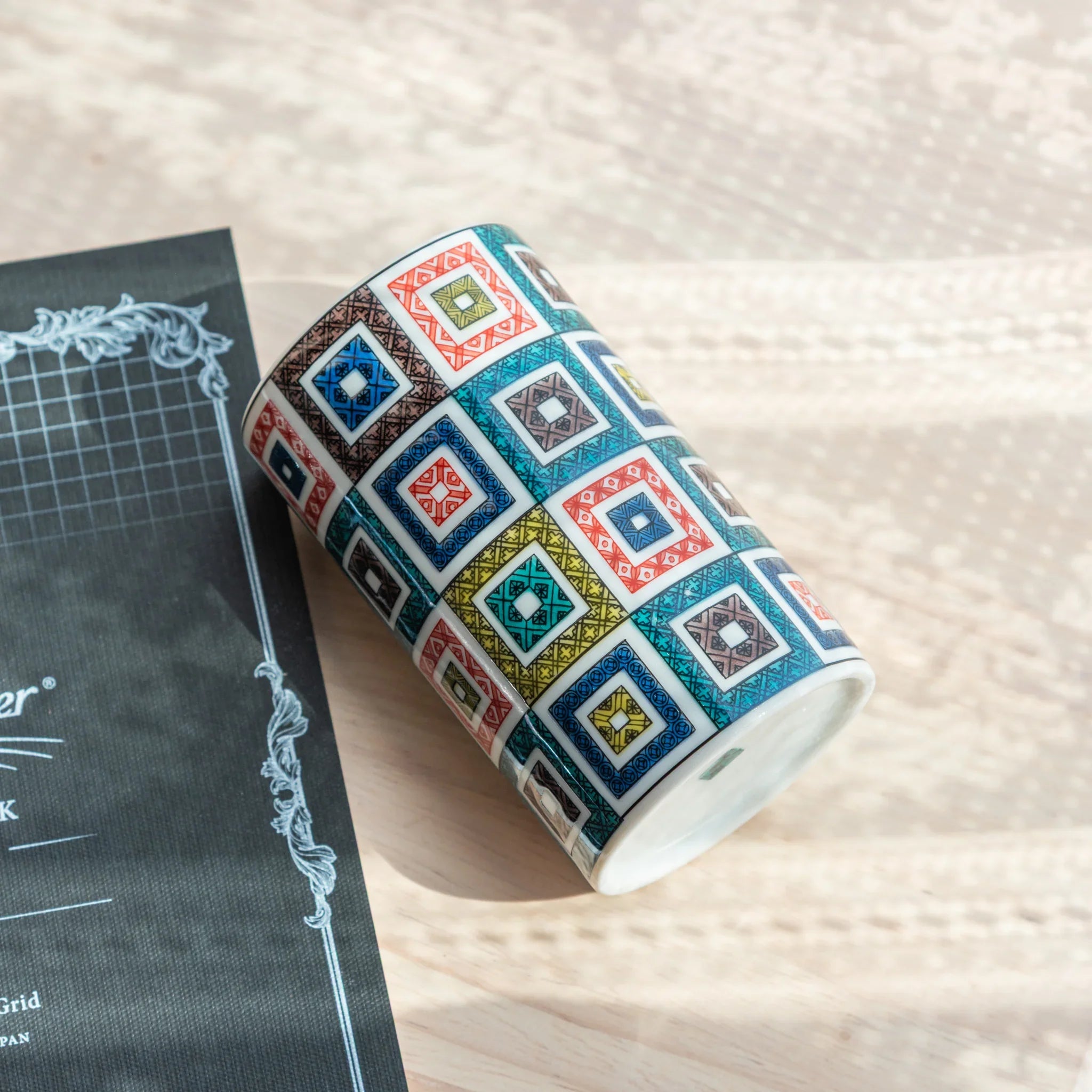 hand-made Kutani ceramic pen holder with hand-painted tile motif in traditional style for refined desk organization