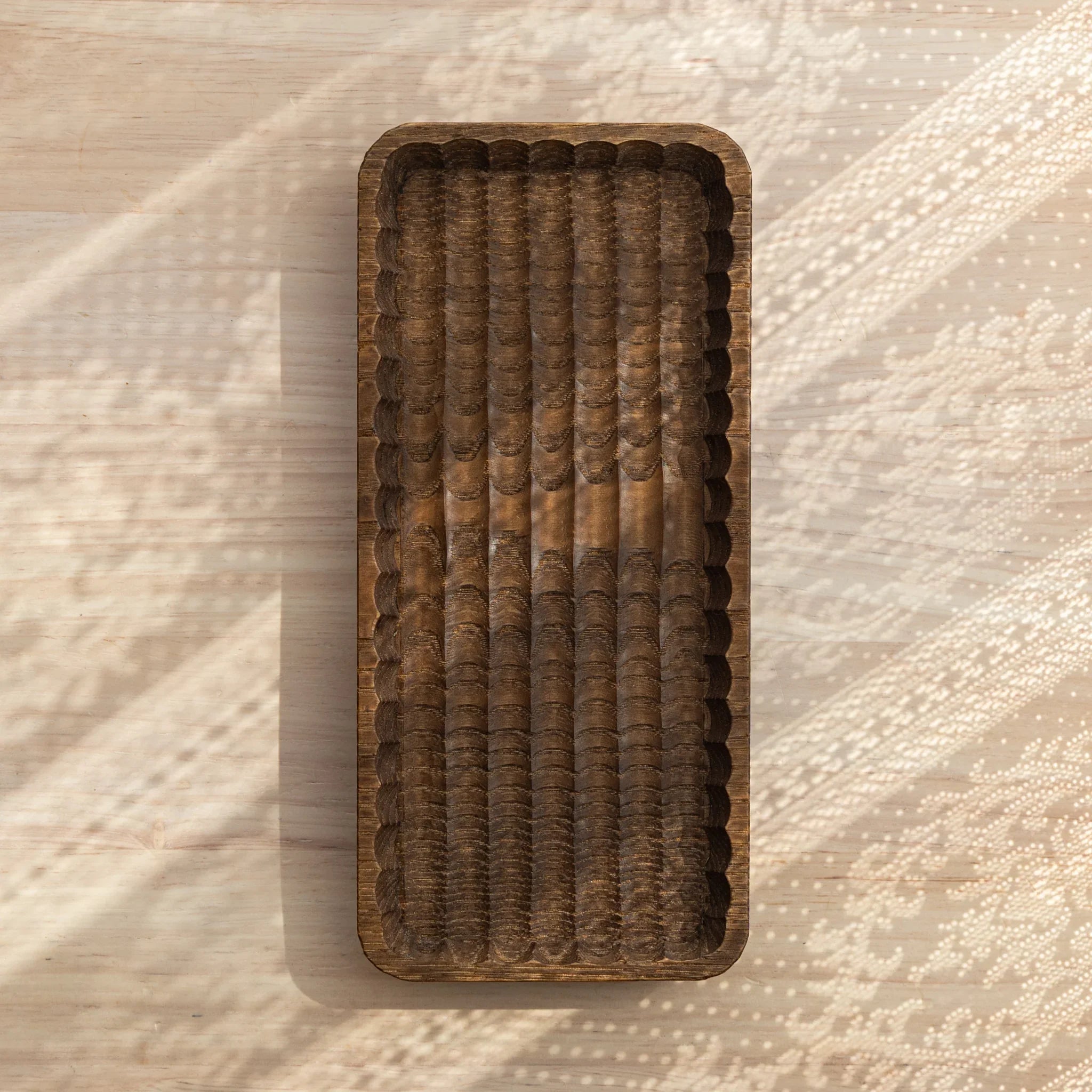 Wagatabon tray displaying pens in hand-carved groove compartments displayed clearly with precise carving detail