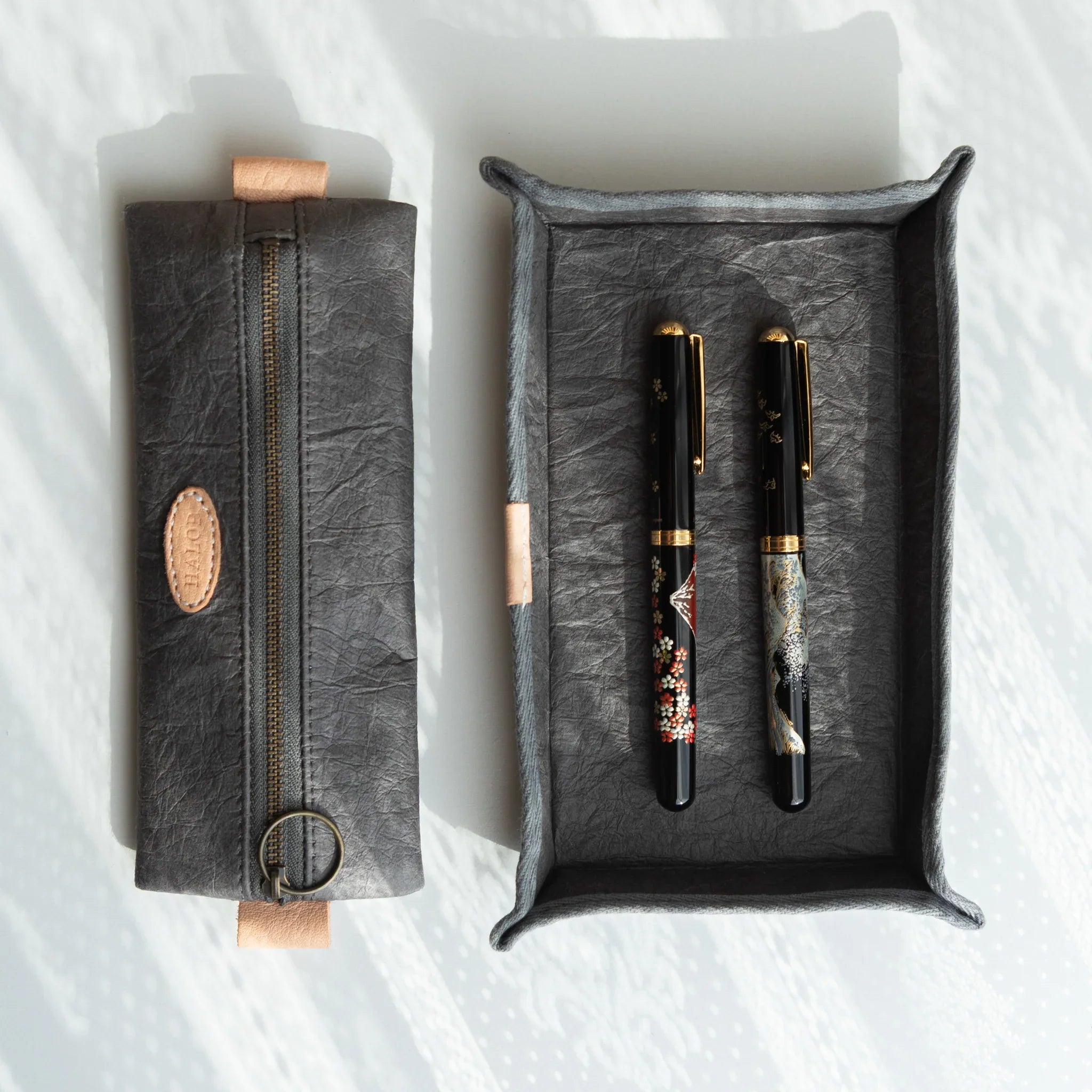 Sugihara washi paper case detail with folded corners and construction on roll in composition composition