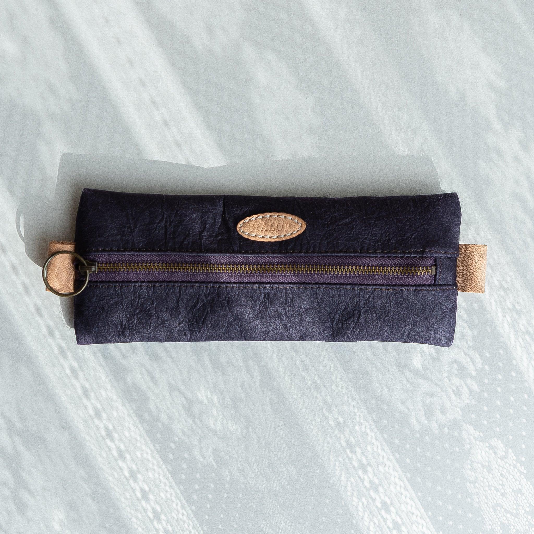 Handcrafted Sugihara washi paper pen case in purple with traditional finish displayed clearly composition