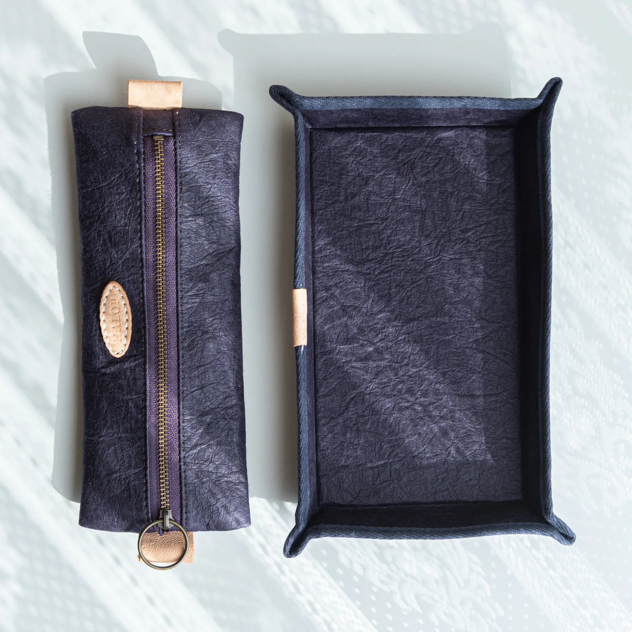 Purple pen case showing paper weight quality and craftsmanship detail and composition in composition