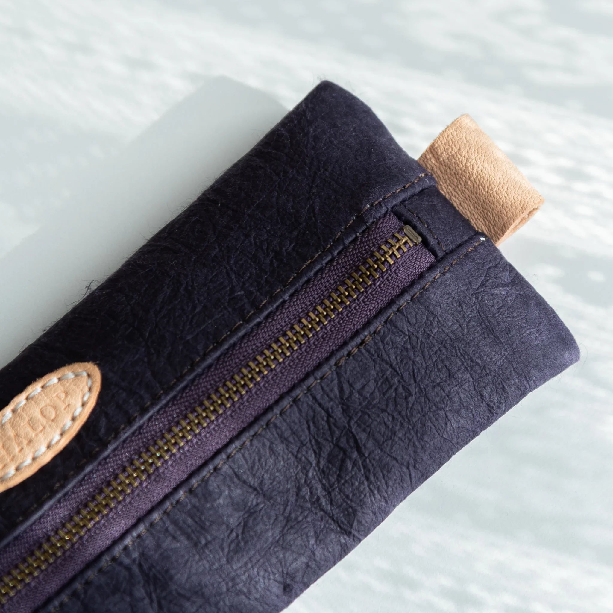 Handcrafted purple Sugihara case showing paper quality and craftsmanship shown in composition composition