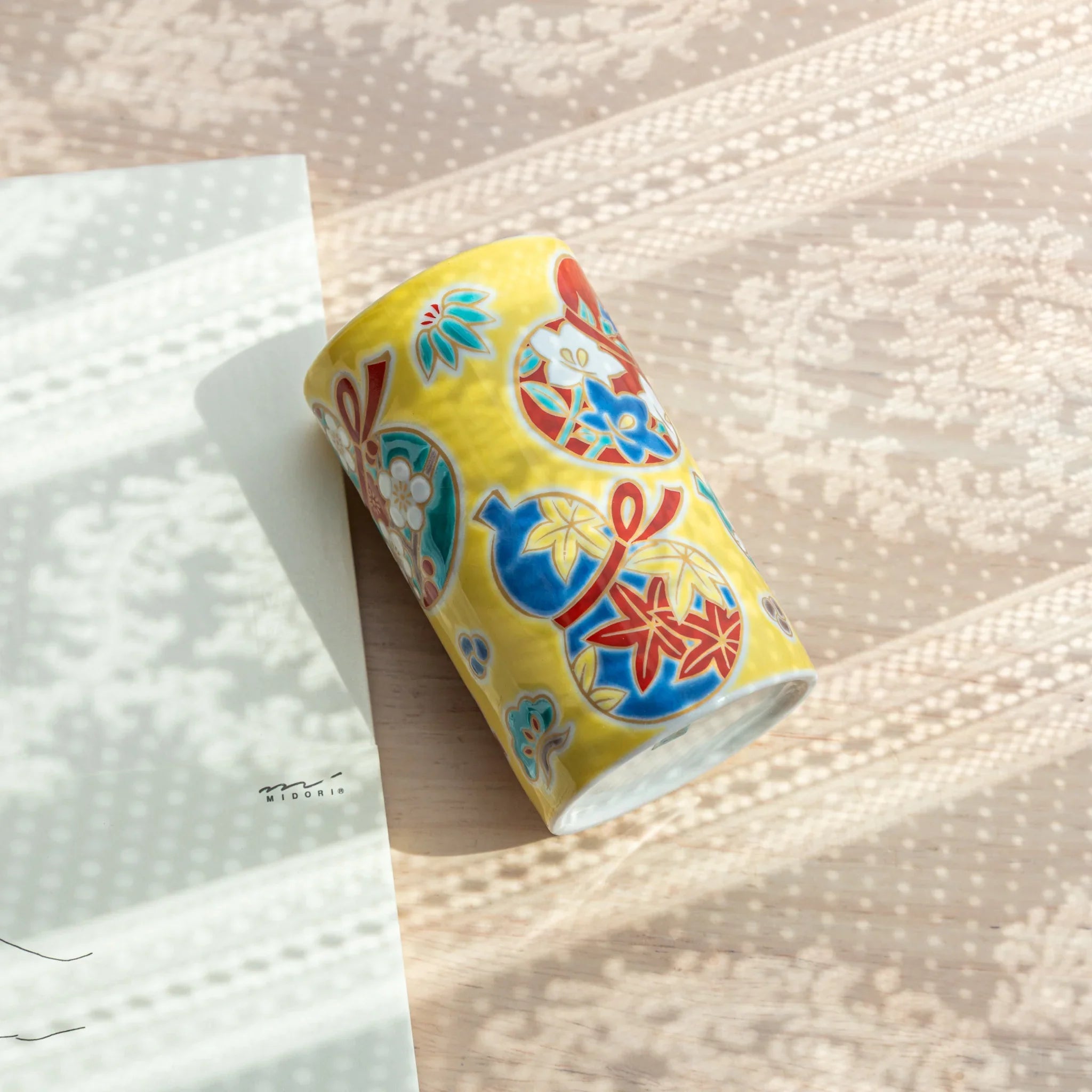 hand-made Kutani ceramic pen holder with gourd form and hand-painted botanical motif for refined desk organization