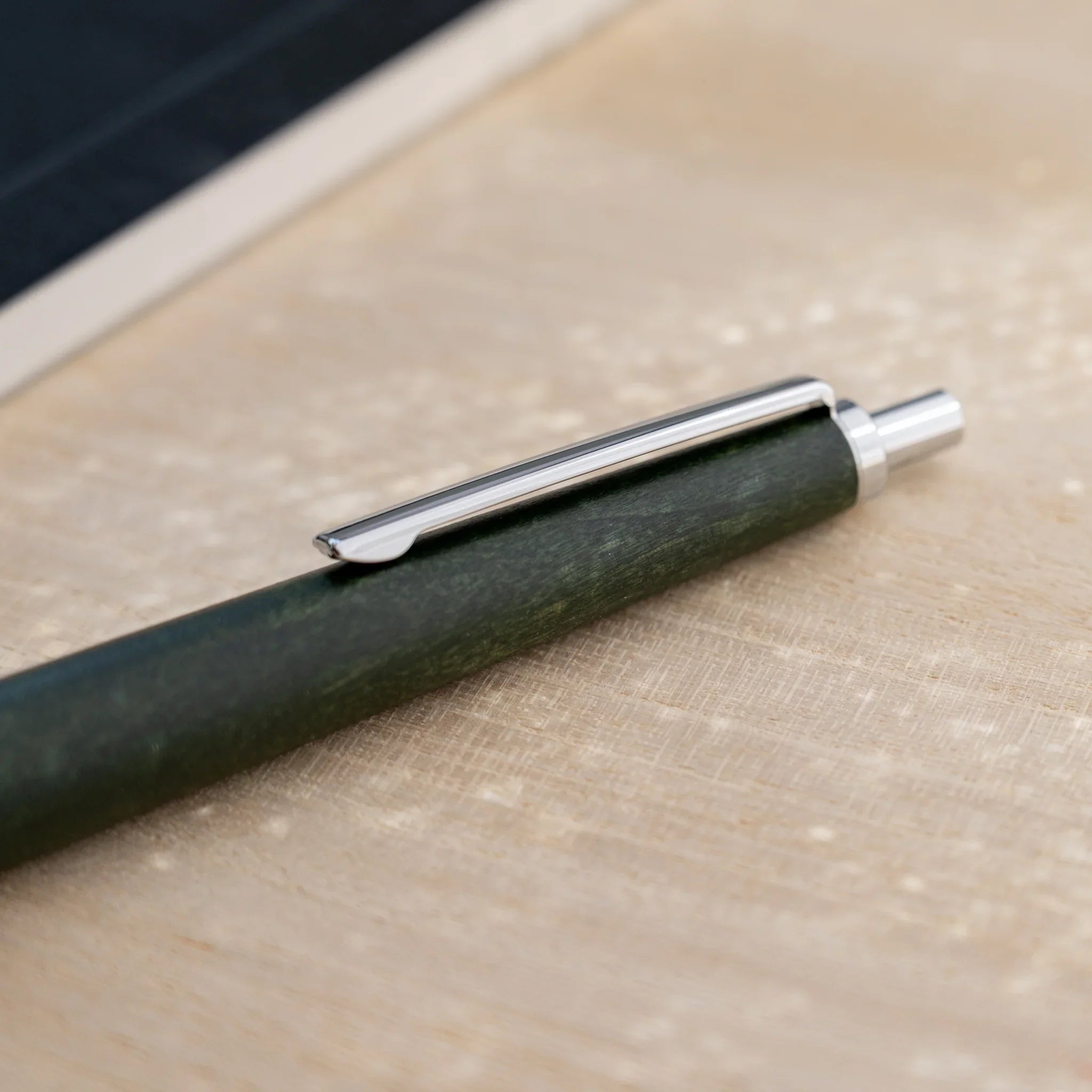 Horse chestnut wood urushi lacquered ballpoint pen in olive green, Japanese wood, silver knock, clip and tip