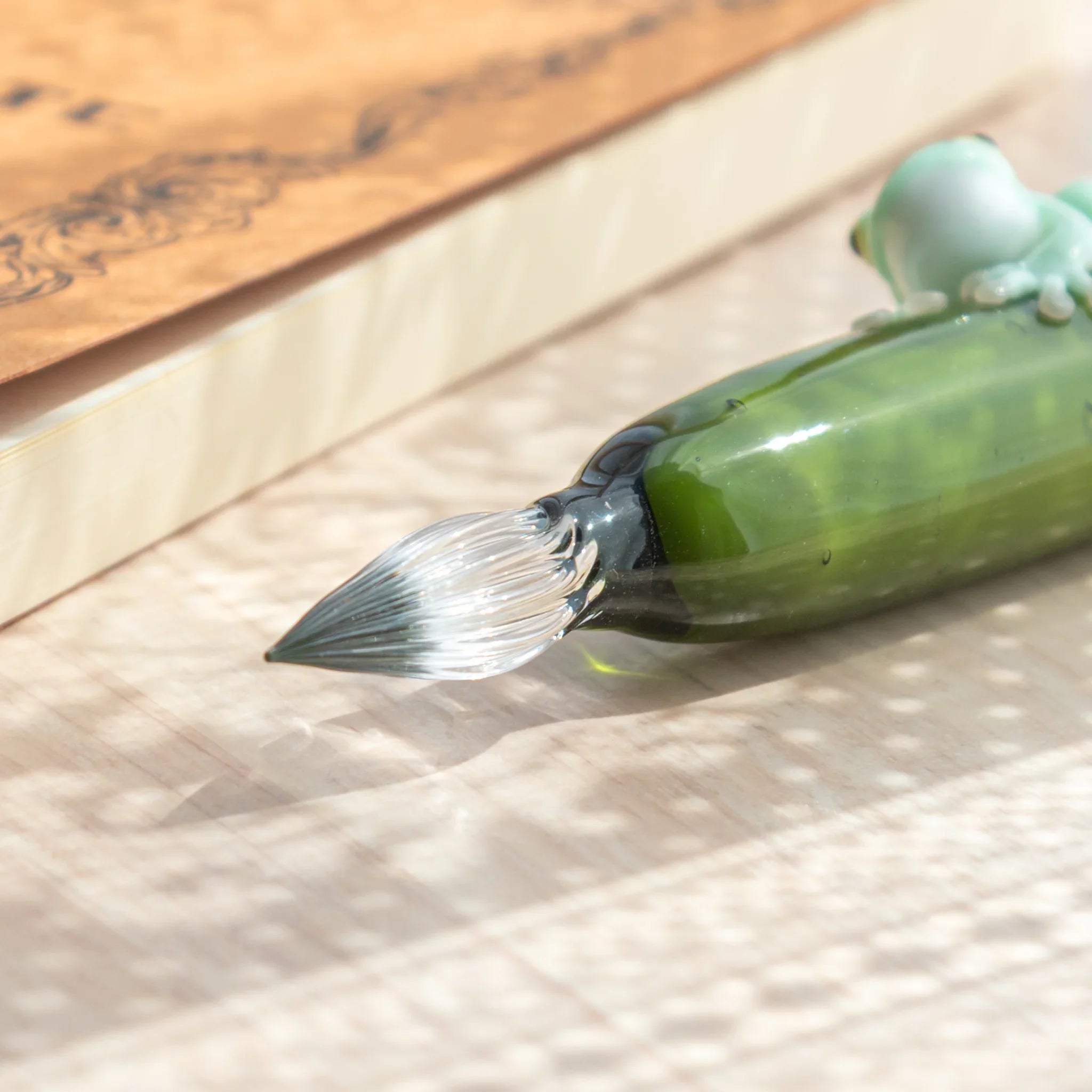 Sage green dip pen with detailed resin work with artistic resin creation and hand-poured glass barrel
