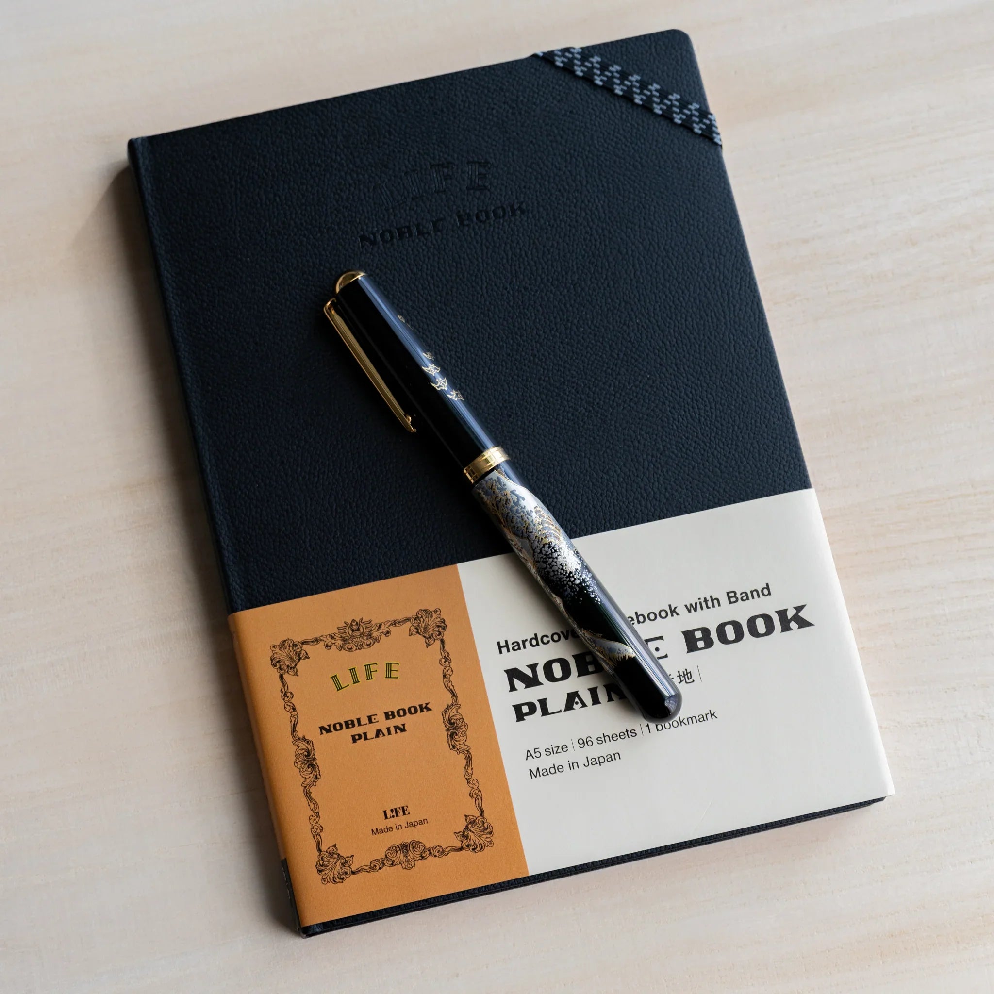 Life Noble A5 planning notebook, open view showing interior pages with binding quality                        