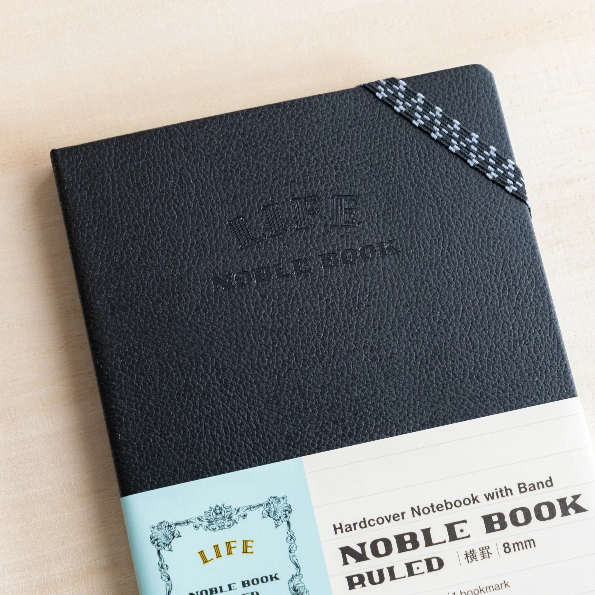 Life Noble A6 hardcover notebook, flat lay display decorative cover showing spine visible                     