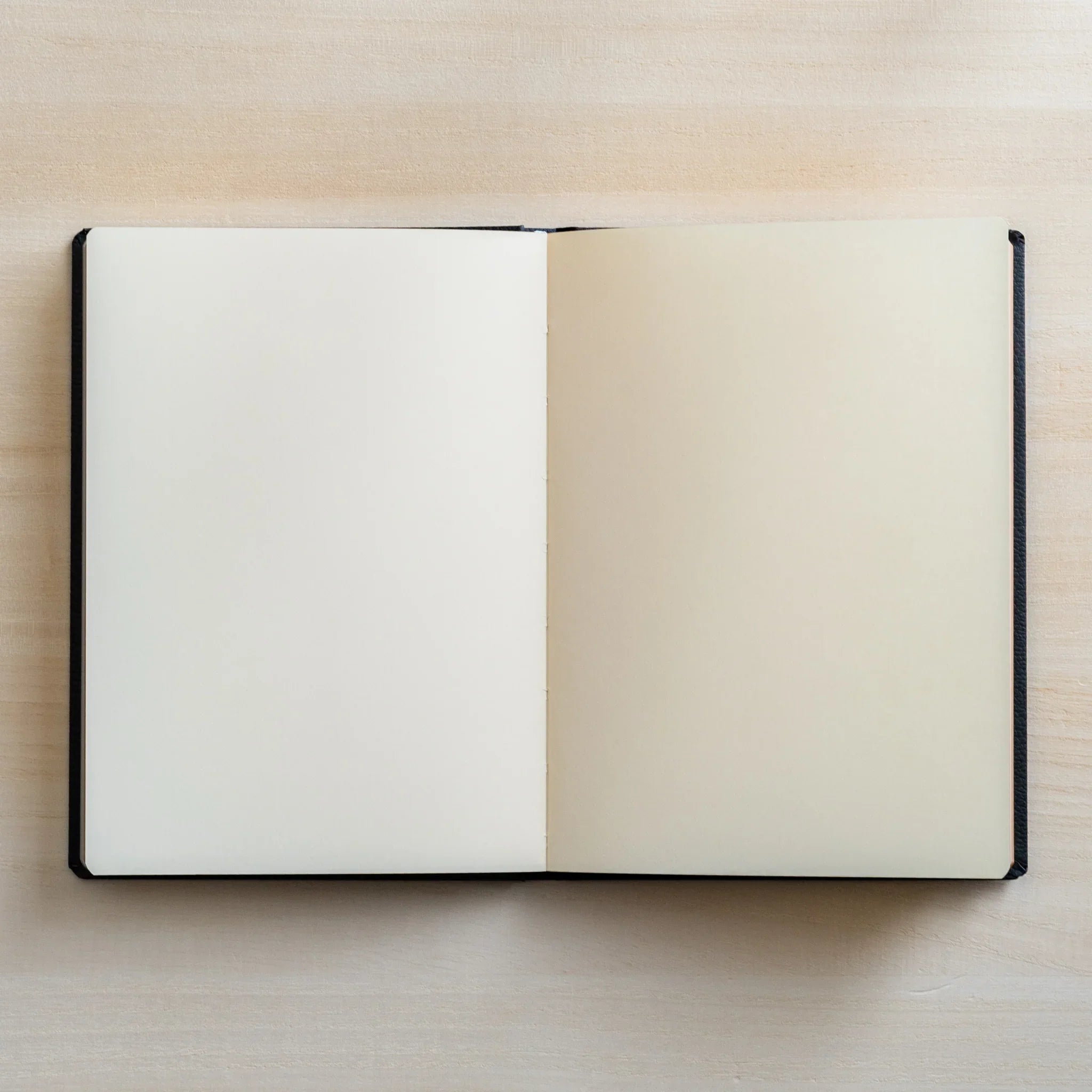 Life Noble A6 notebook, closed front cover interior pages showing binding quality, LIFE Japan A6 hardcover notebook with crea