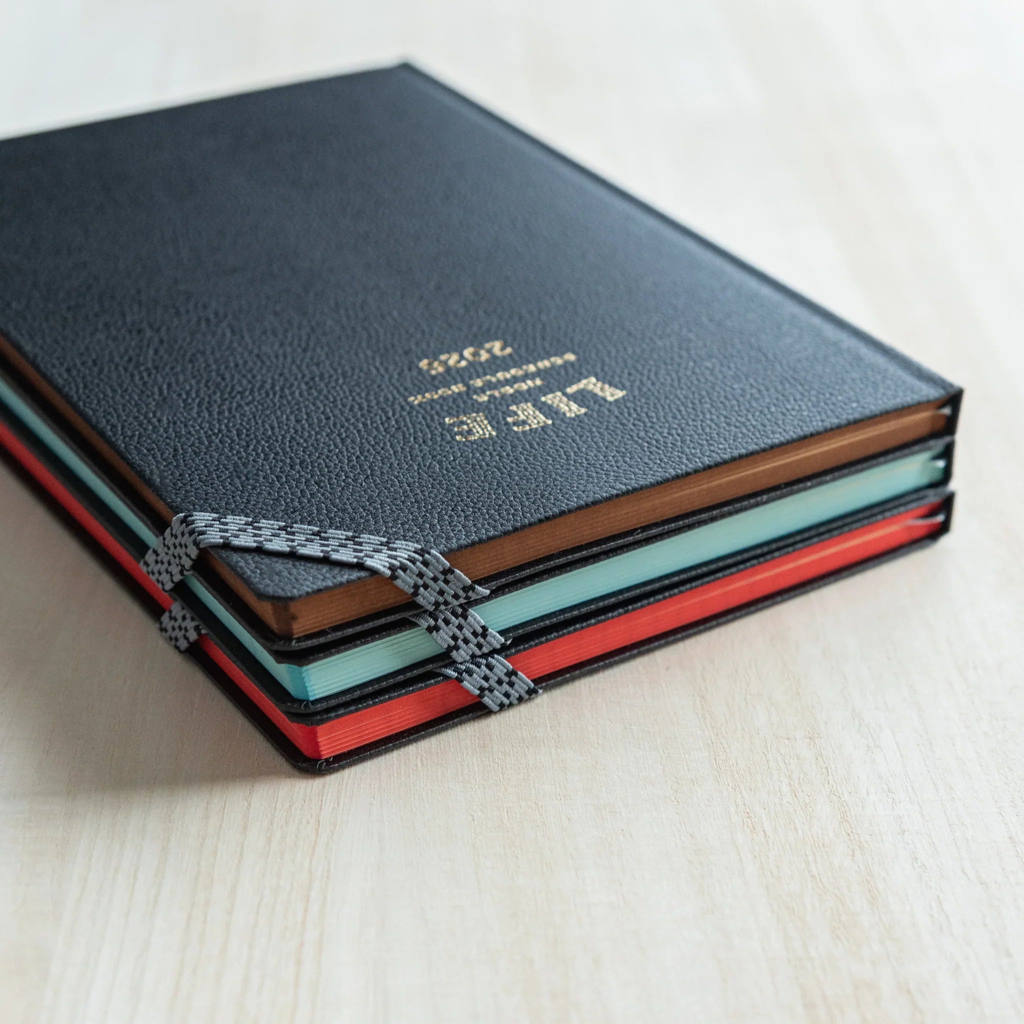 Life Noble 2026 hardcover planner, navy leather cover, full view display highlighting leather, LIFE Japan