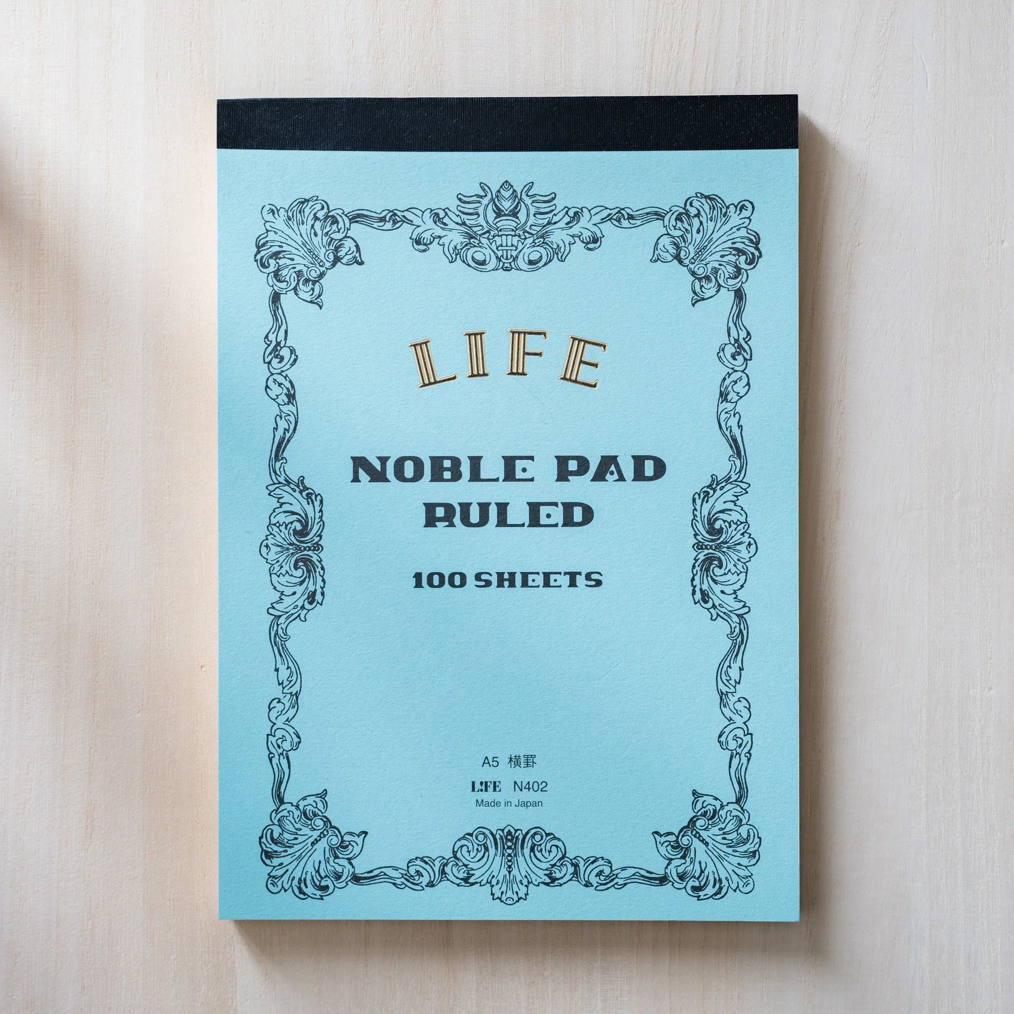 Life Noble A5 memo pad, arranged view stylized cover and paper quality                                        