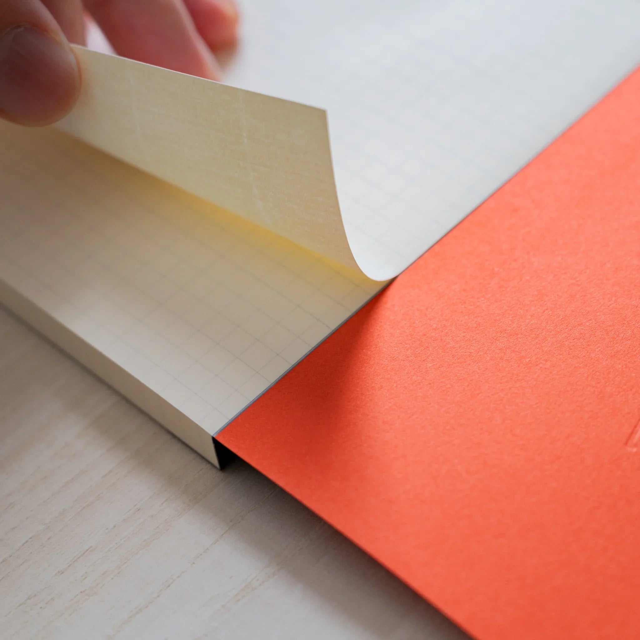 Life Noble B6 memo pad, overhead display stylized cover highlighting paper quality                            