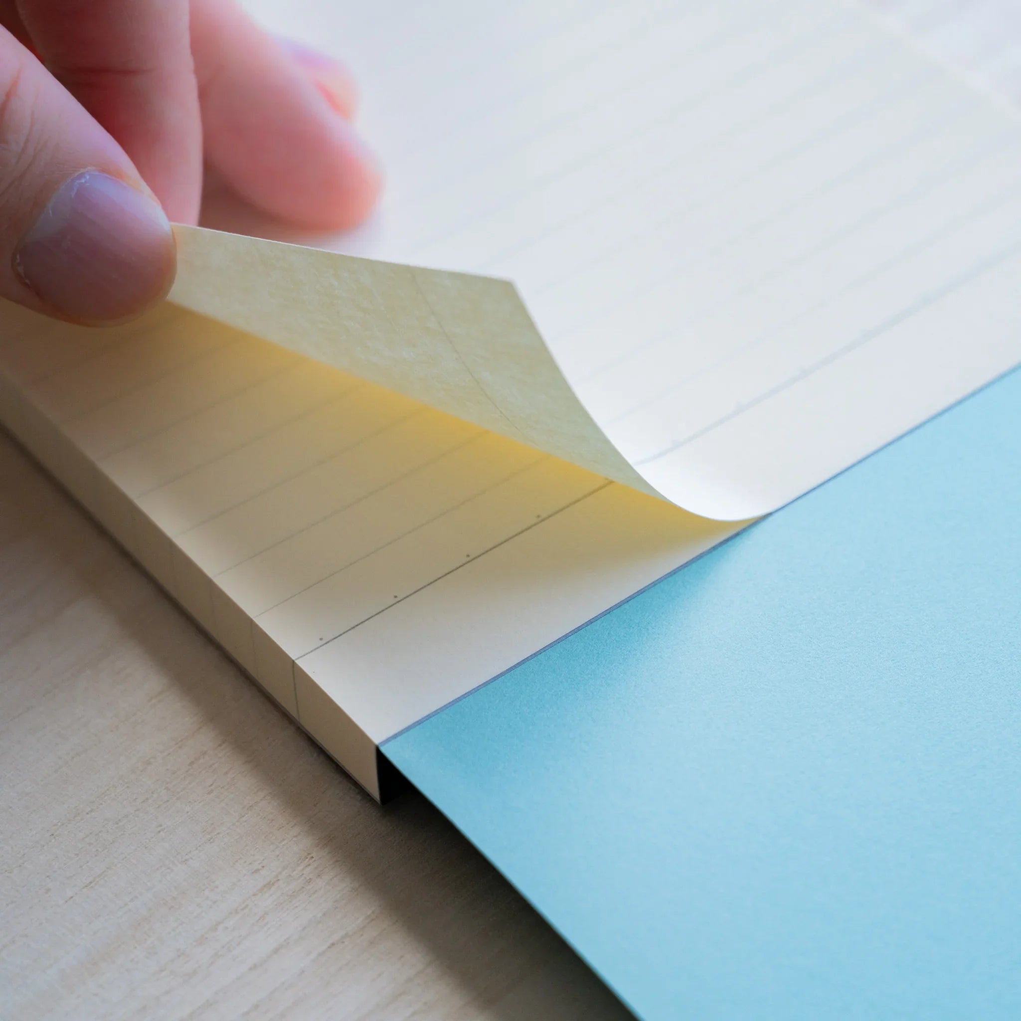 Life Noble B6 stationery pad, angled view showing decorative pattern highlighting binding detail              