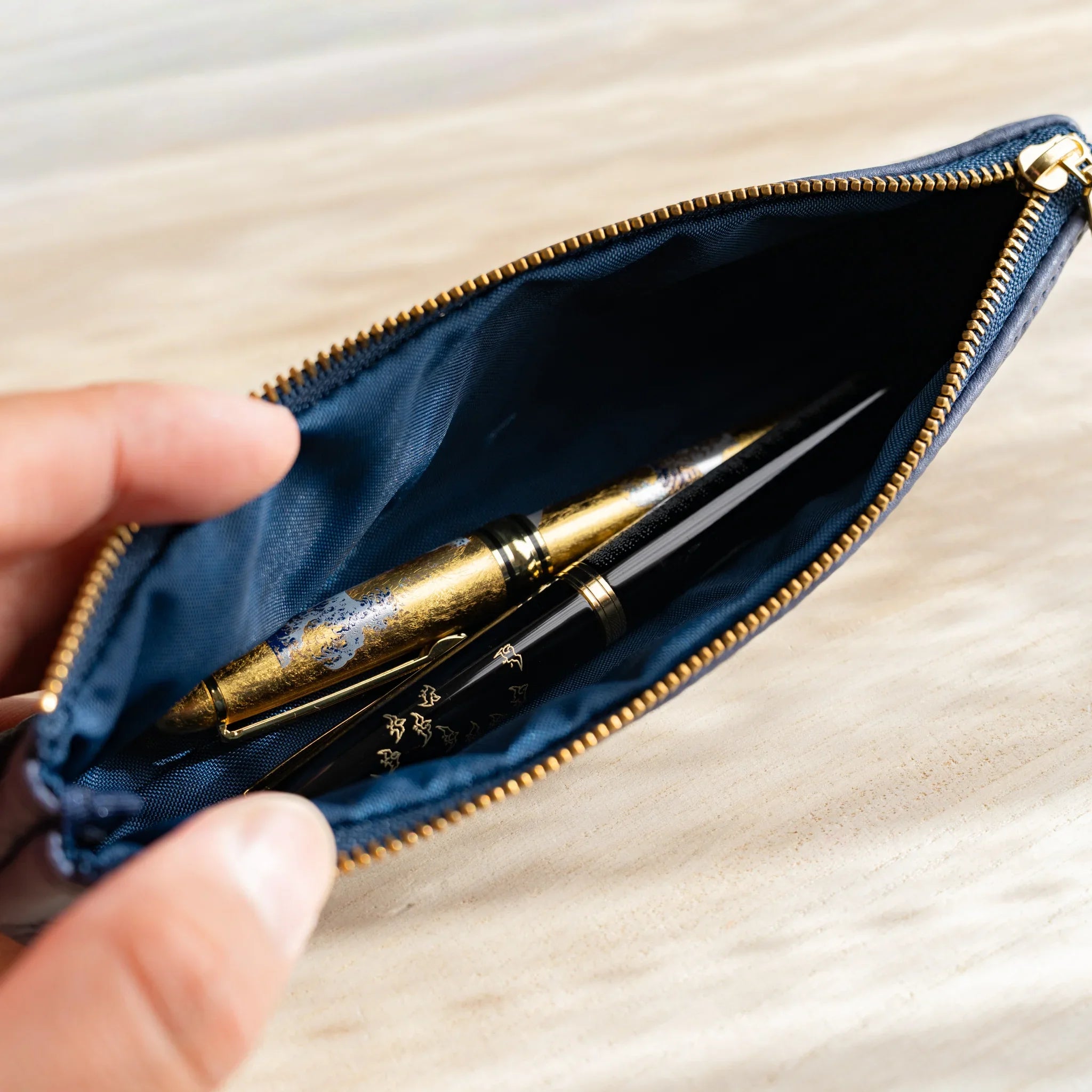 Navy leather pen case showing deep blue color and leather texture and features and features and features