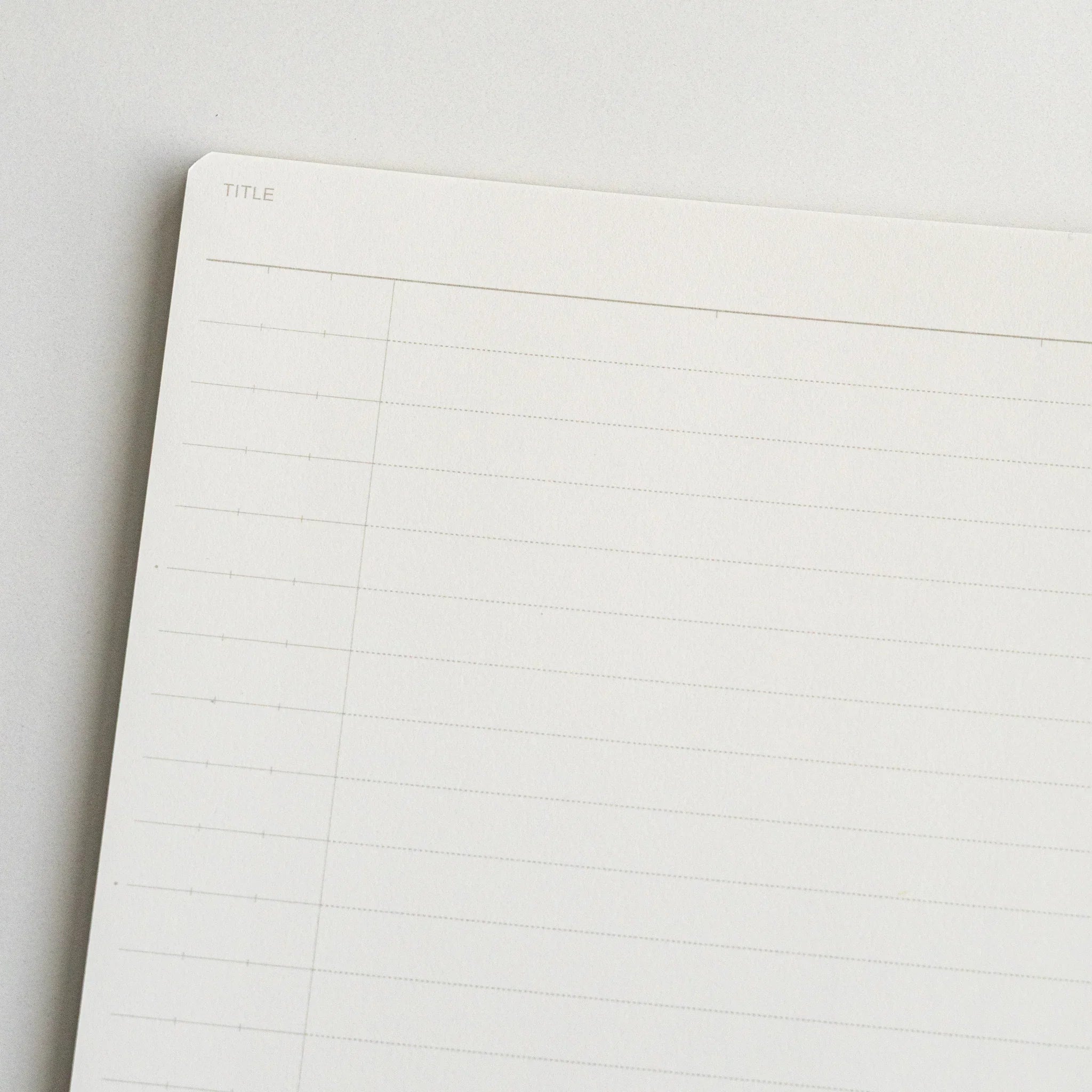 Maruman Mnemosyne notebook, angled view showing lines on open pages, Mnemosyne Maruman Japan A4 or A5 notepad with perforated