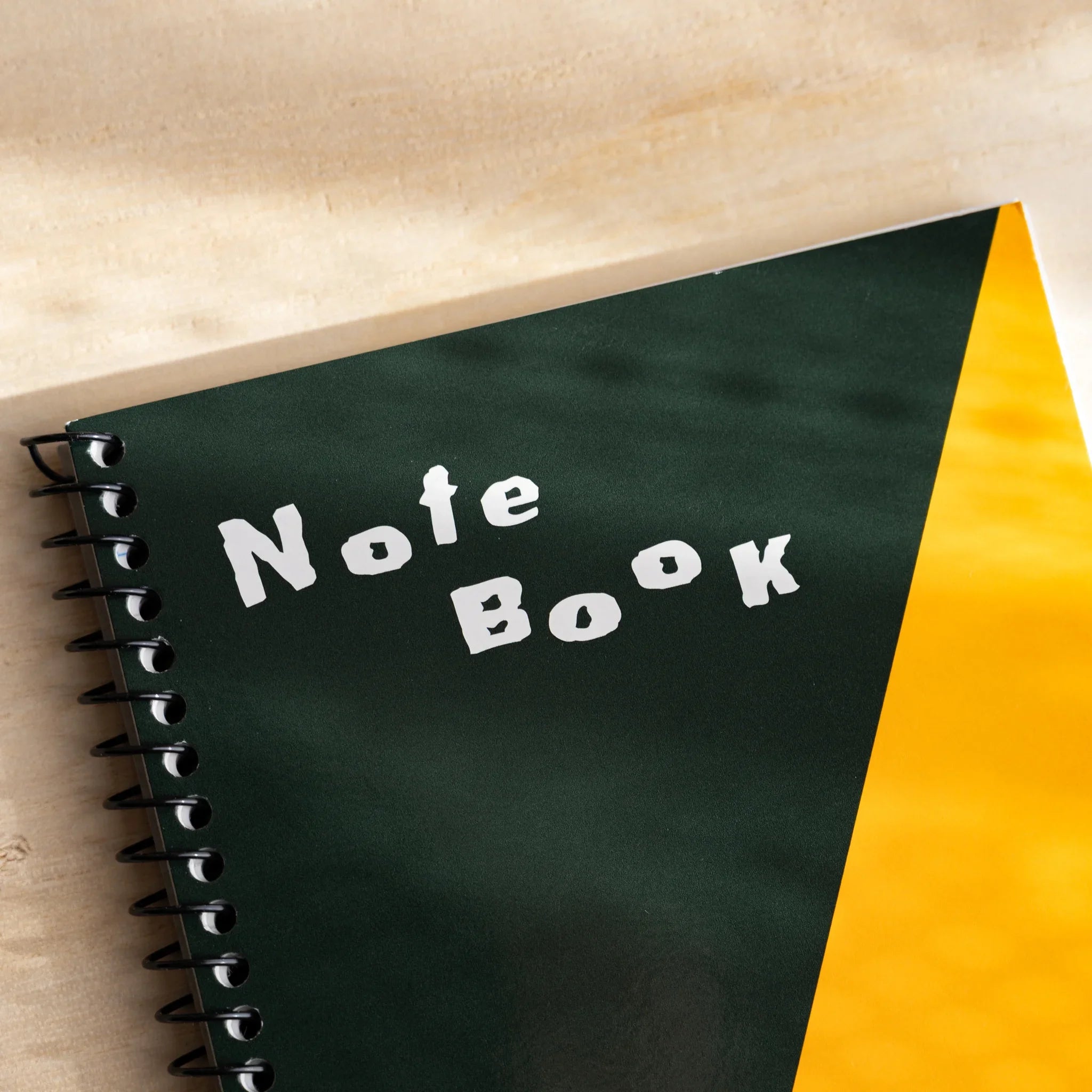 Maruman Zuan A6 notebook showing ring binding and paper pages with visible detail                             