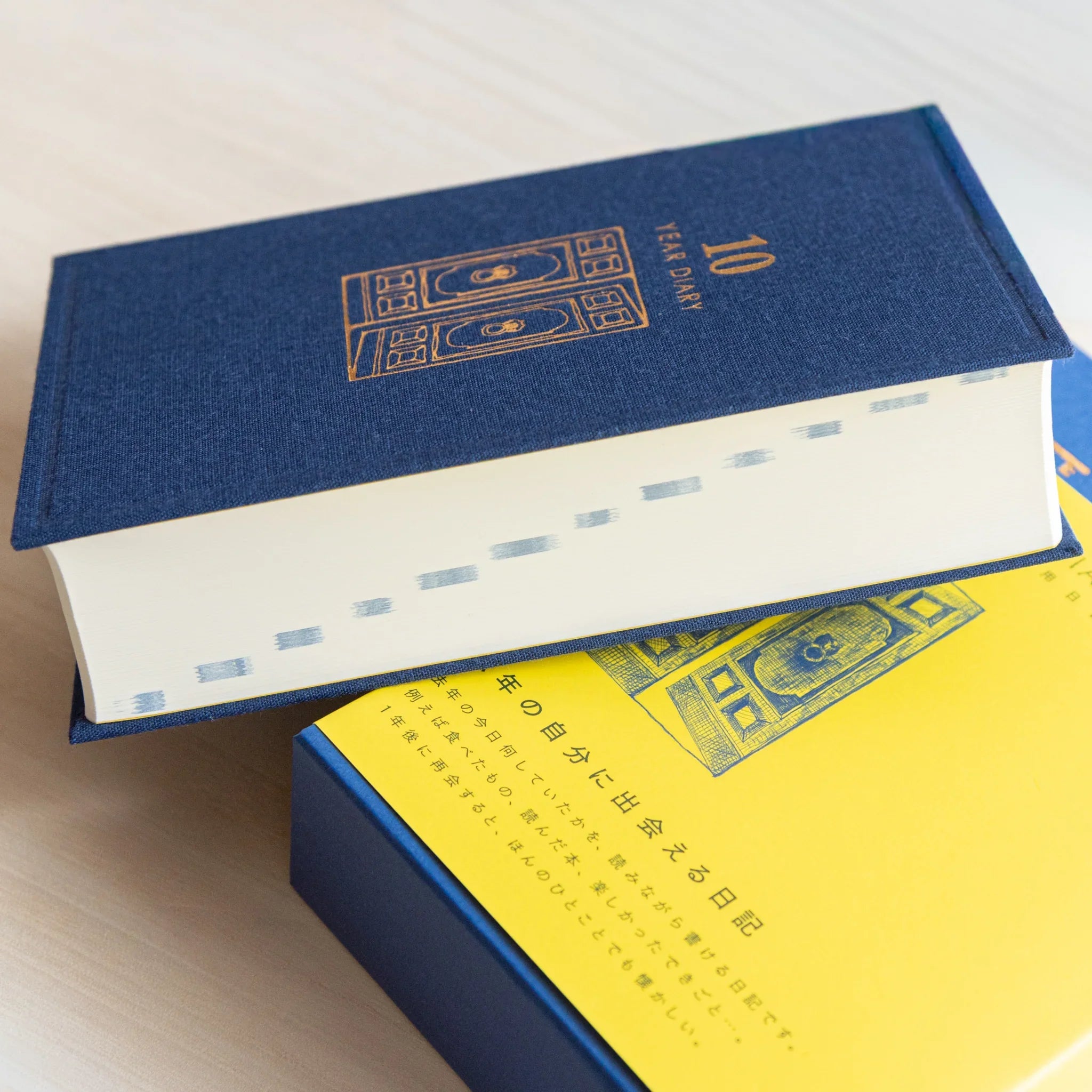 Midori 10-year journal, detail shot of gate embossing pattern on cover surface, Japanese stationery product with quality