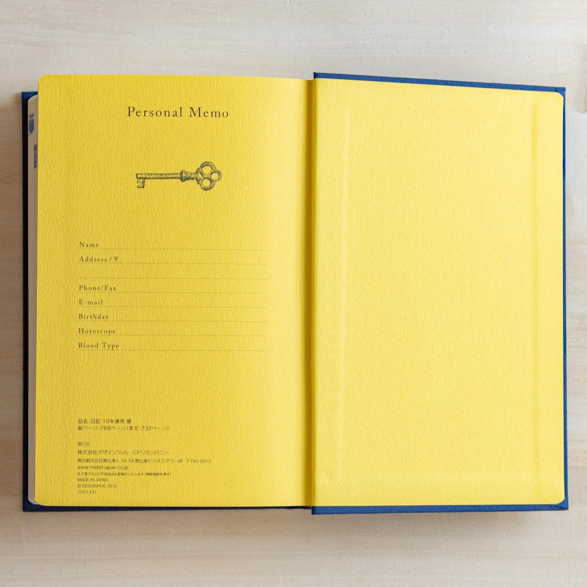 Midori 10-year journal, opened to showing year overview page and date layout, Japanese stationery with quality materials and