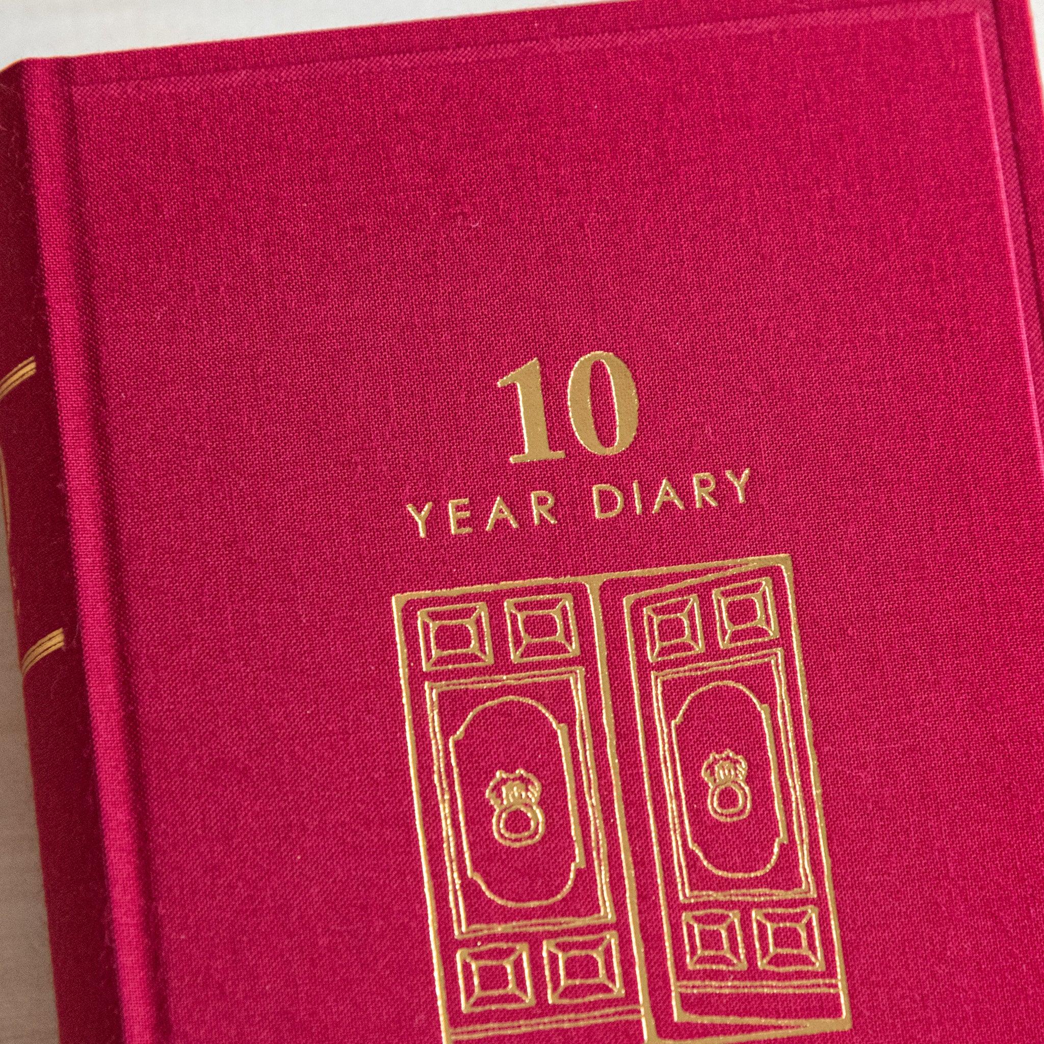 Midori 10-year journal, angled view of closed journal showing gate embossing, Japanese stationery item with quality