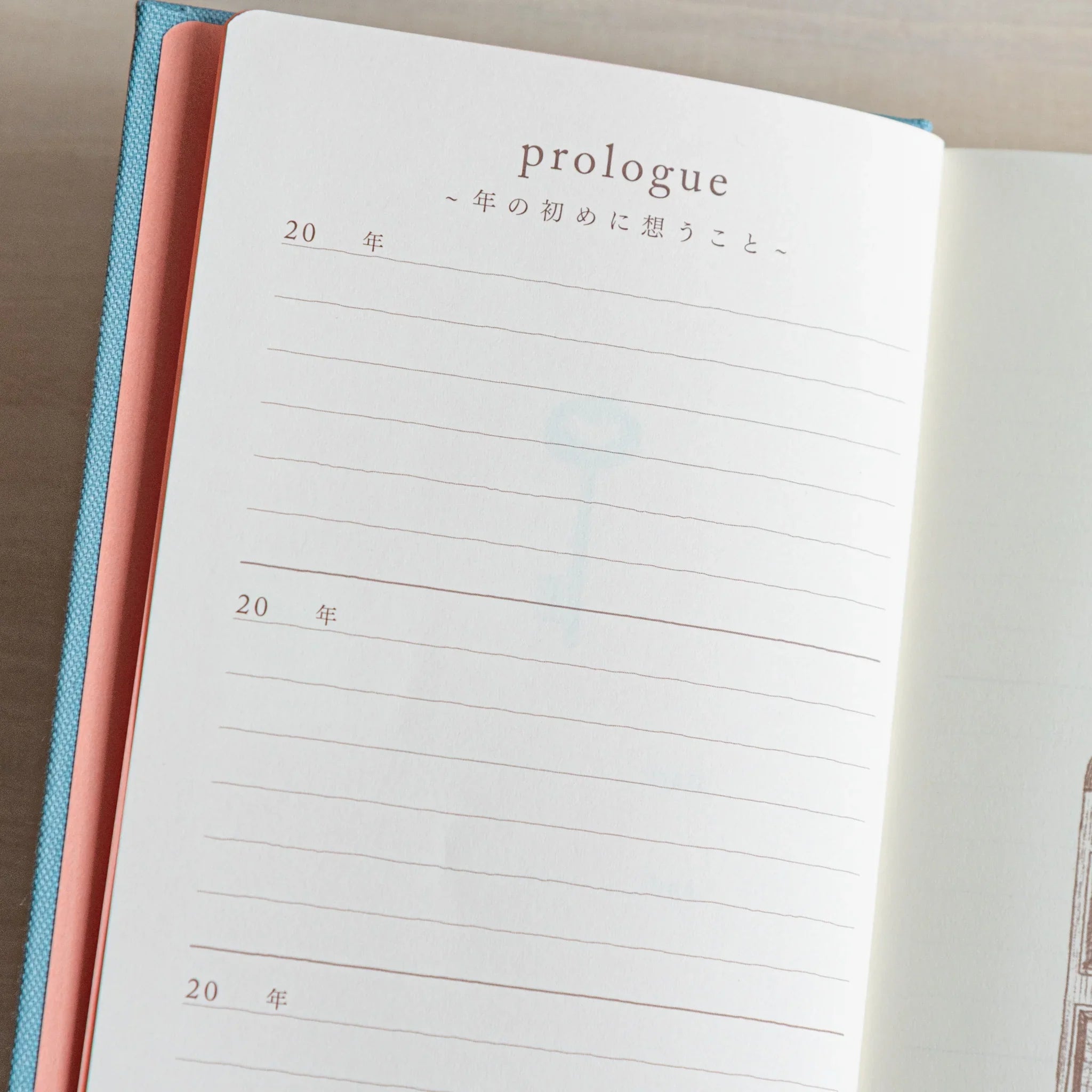 Midori 3-year journal, page detail showing ruled lines and date spacing, Midori 3-year journal with embossed cover for