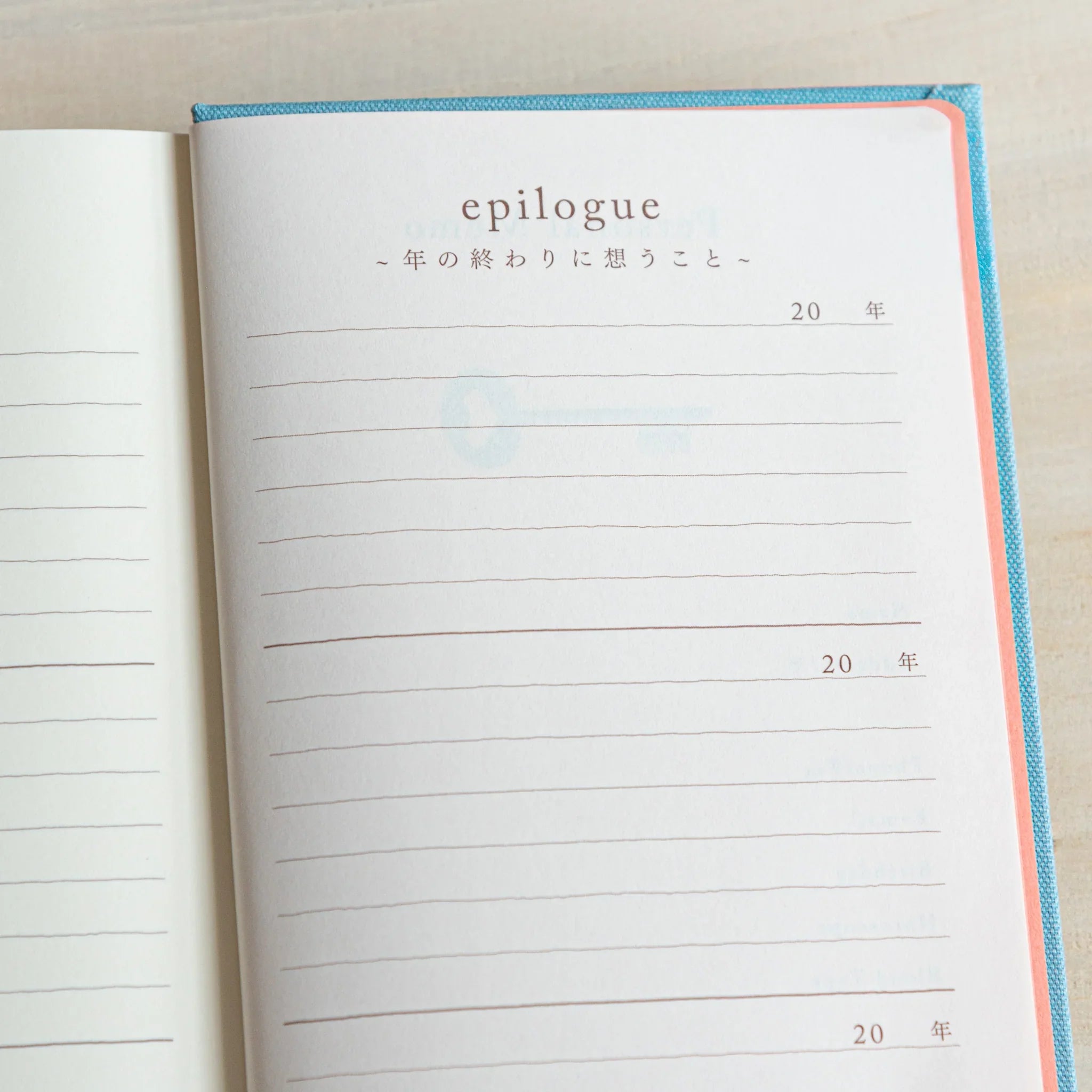 Midori 3-year journal, interior pages showing year divider tabs, compact Midori 3-year dated hardcover notebook made in Japan