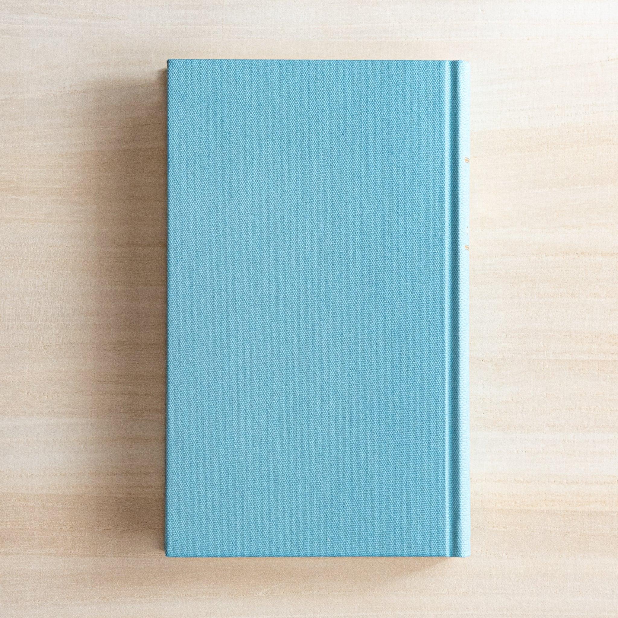 Midori 3-year journal, opened to showing three-year overview page, Midori 3-year journal with embossed cover for long-term