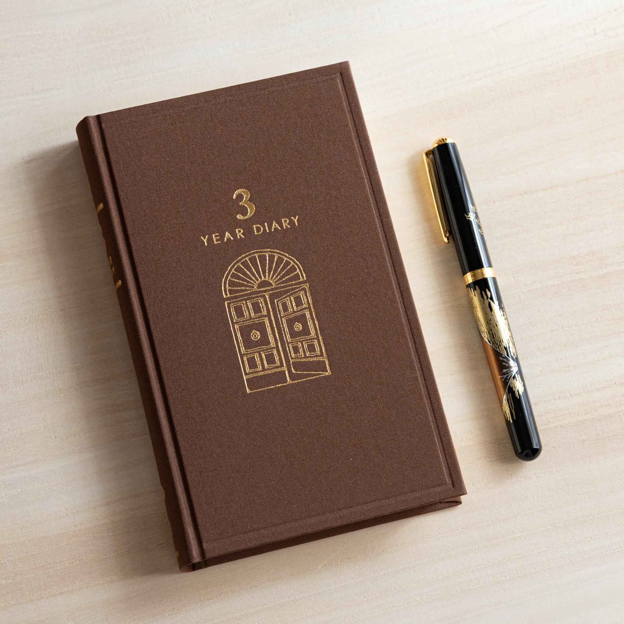 Midori 3-year journal, interior double-page spread with ruled lines, compact Midori 3-year dated hardcover notebook made in