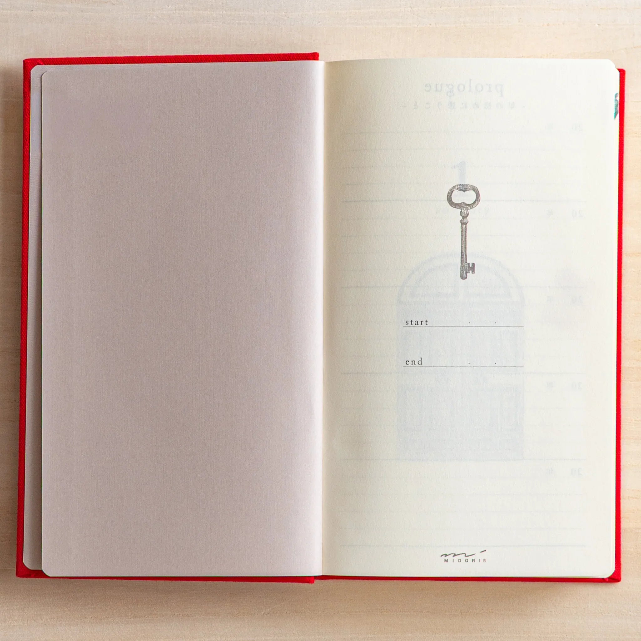 Midori 5-year journal, full page spread showing five-year calendar layout, Japanese stationery item with quality construction