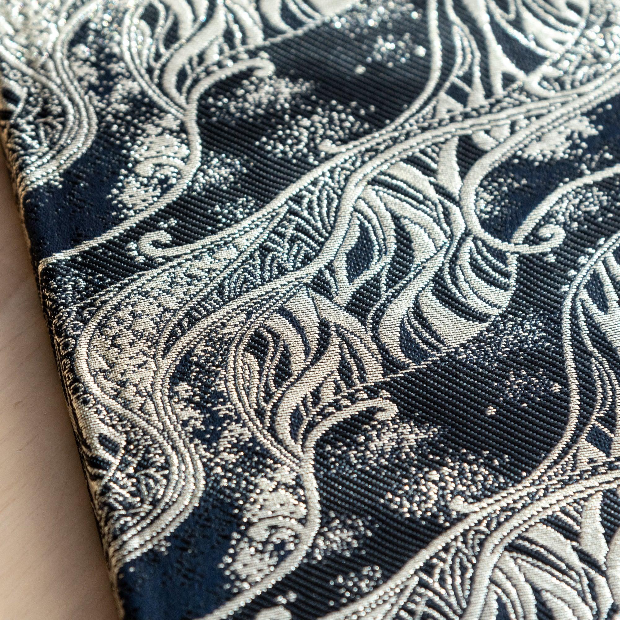 Japanese Nishijin textile B6, angled shot of traditional brocade Misty Streams pattern design with binding