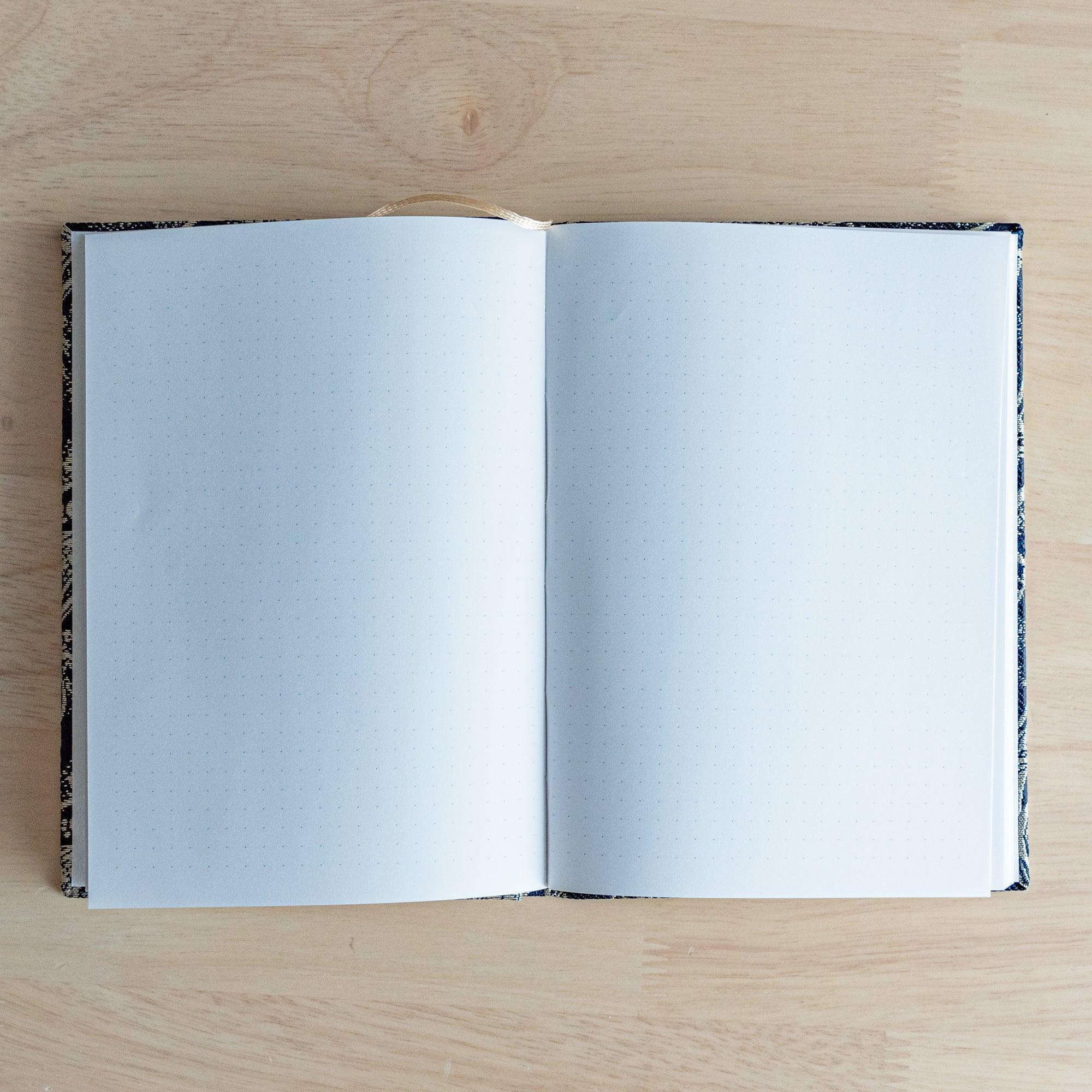 Nishijin textile B6 notebook, flat lay of traditional Misty Streams brocade design detail with binding