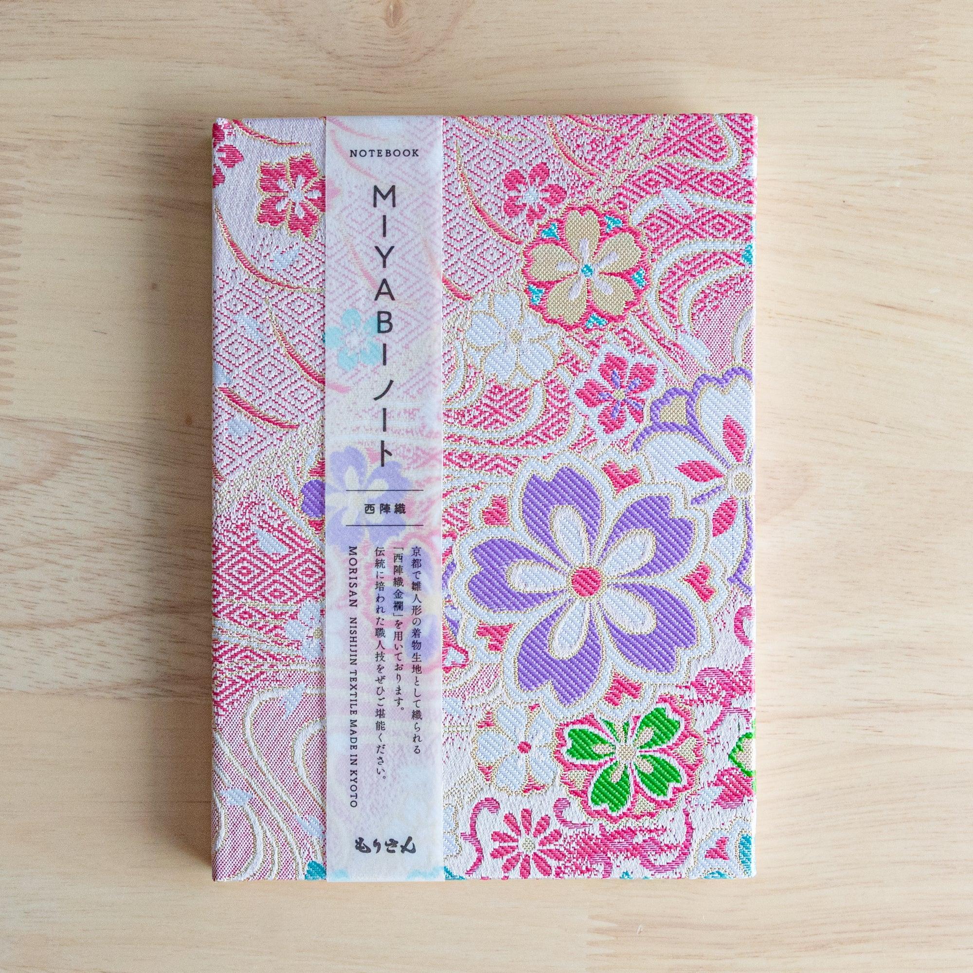 Nishijin Sakura Brocade textile B6, angled display of cherry blossom brocade pattern detail with binding