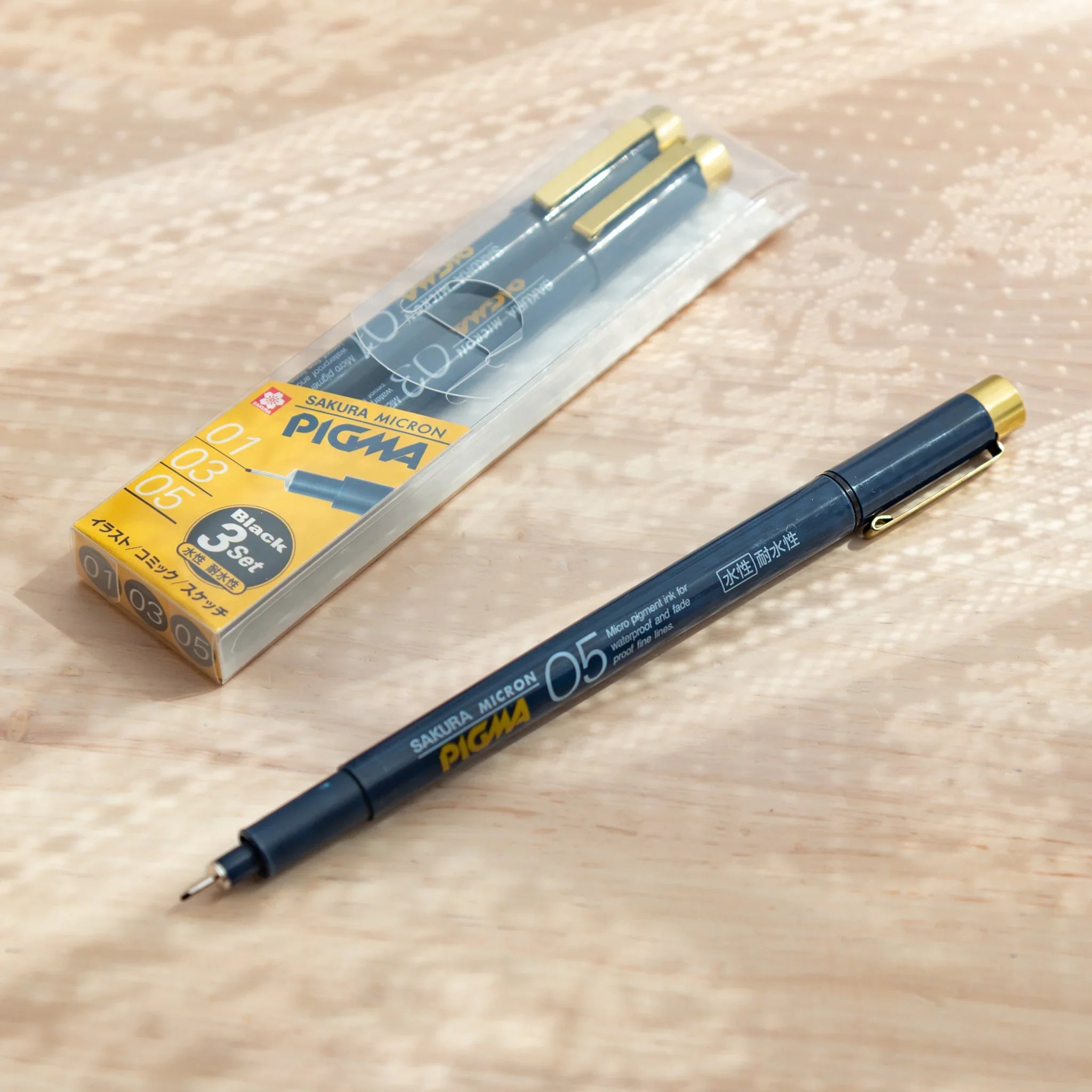 Pigma Micron Fineliner Drawing Pens Set (3 Sizes) precision fineliner pen in-use demonstration with writing on paper surfa