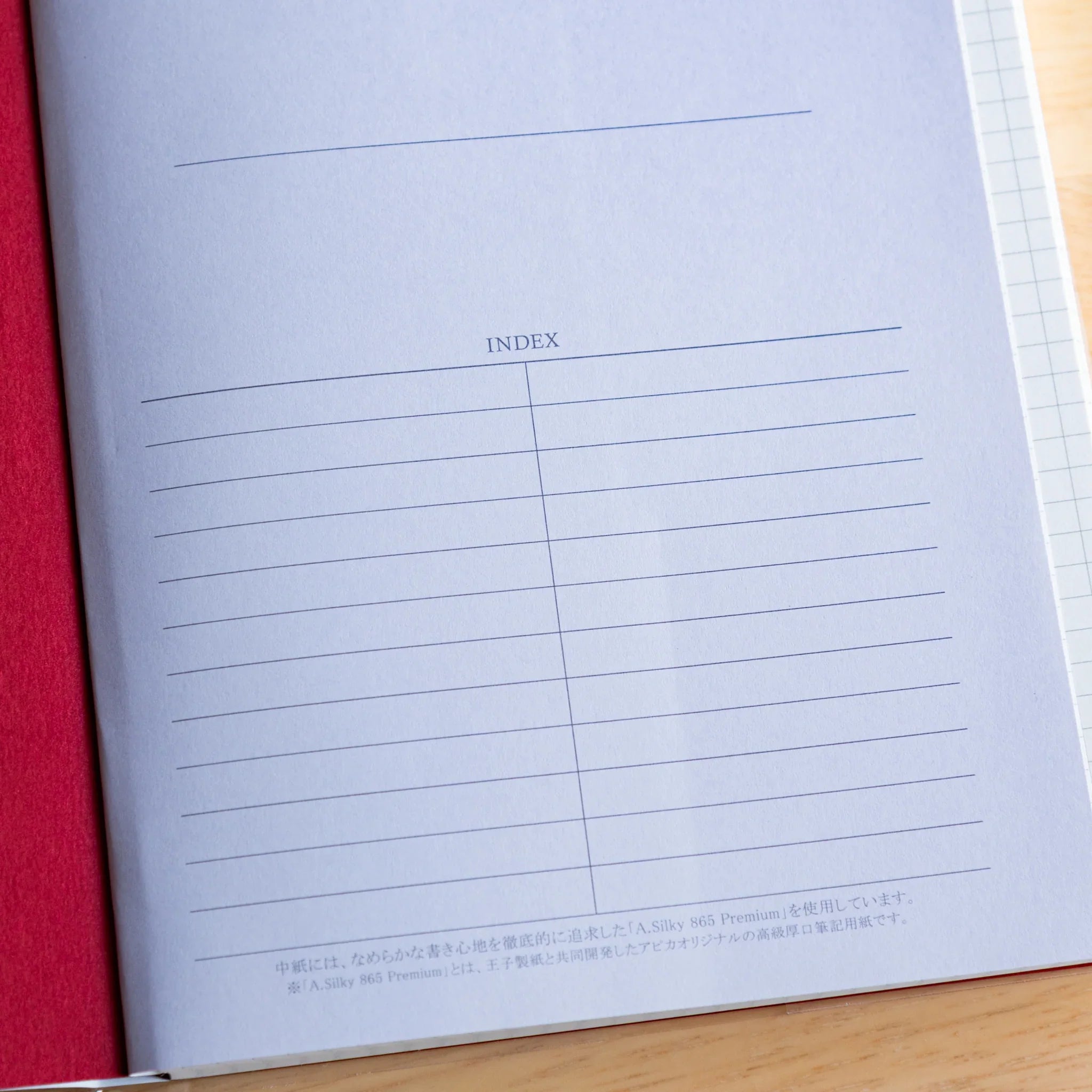 Apica Premium CD Silky notebook navy blue cover detail showing premium fabric texture Japanese Japanese premium
