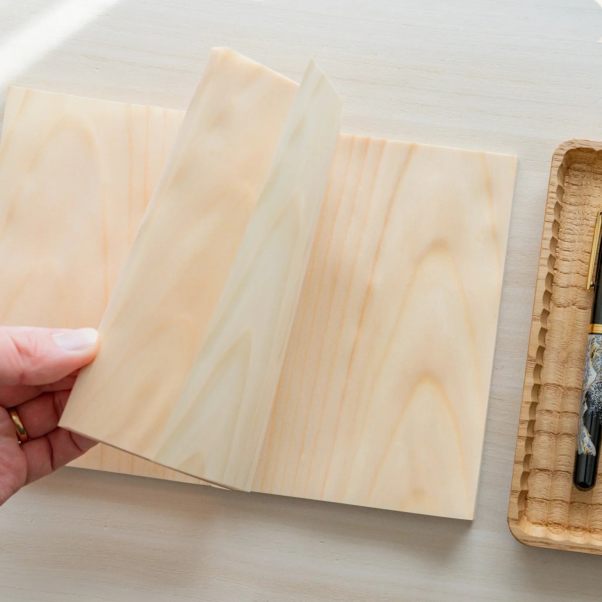 Red Pine wooden page B6 notebook, natural wood grain front cover detail showing wood texture and binding