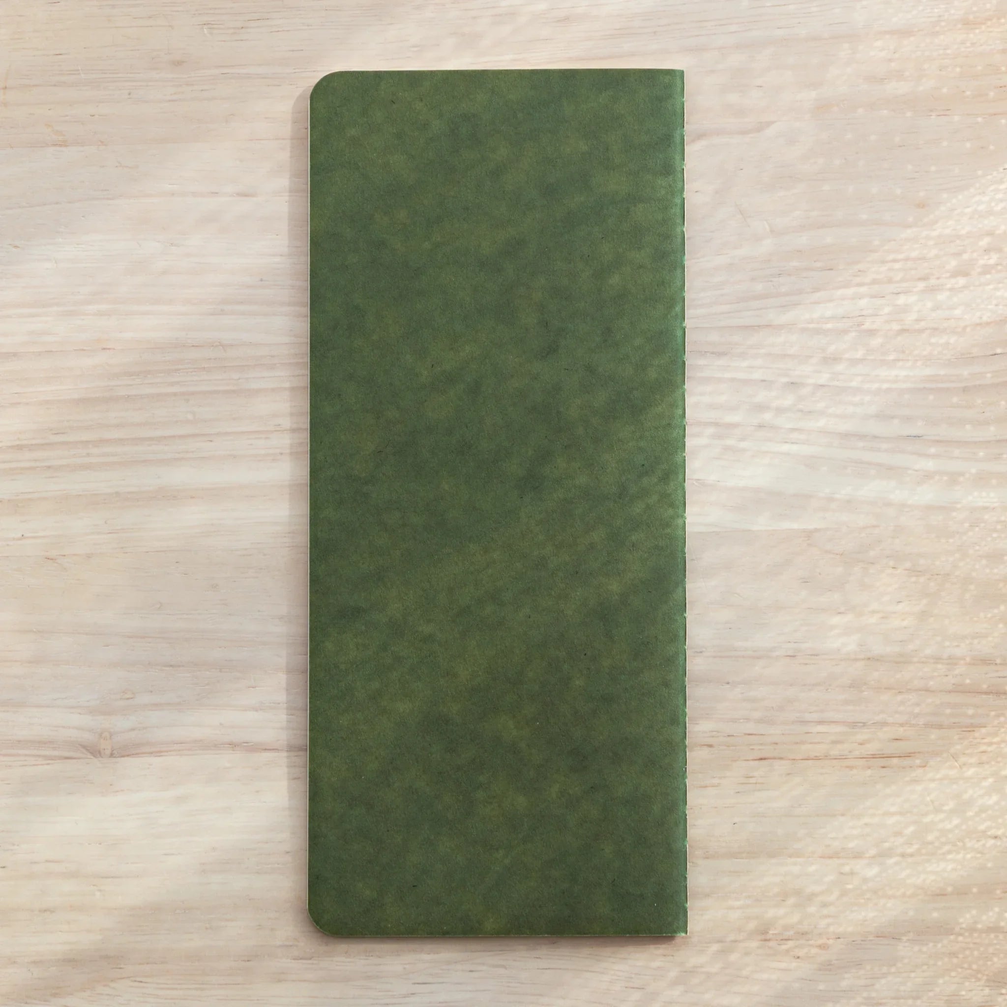 RO-BIKI Basic notebook with 6mm ruled pattern displayed flat showing slate blue cover and organized interior spacing