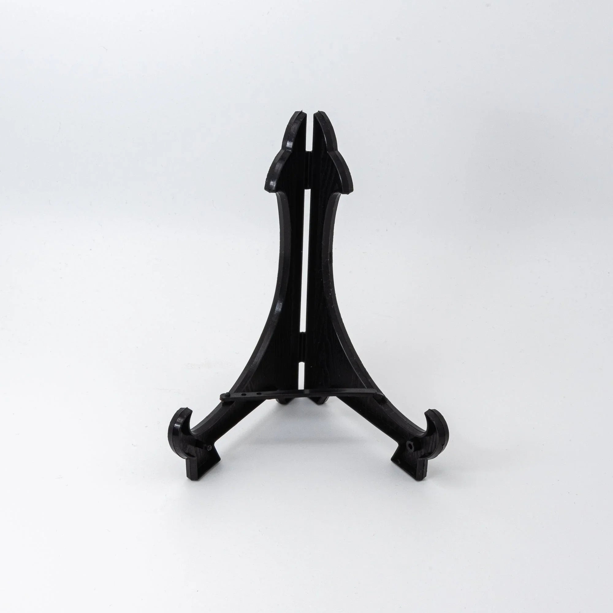 Black plastic display easel stand included with Japanese shippo ware pen tray, shown alone on white background
