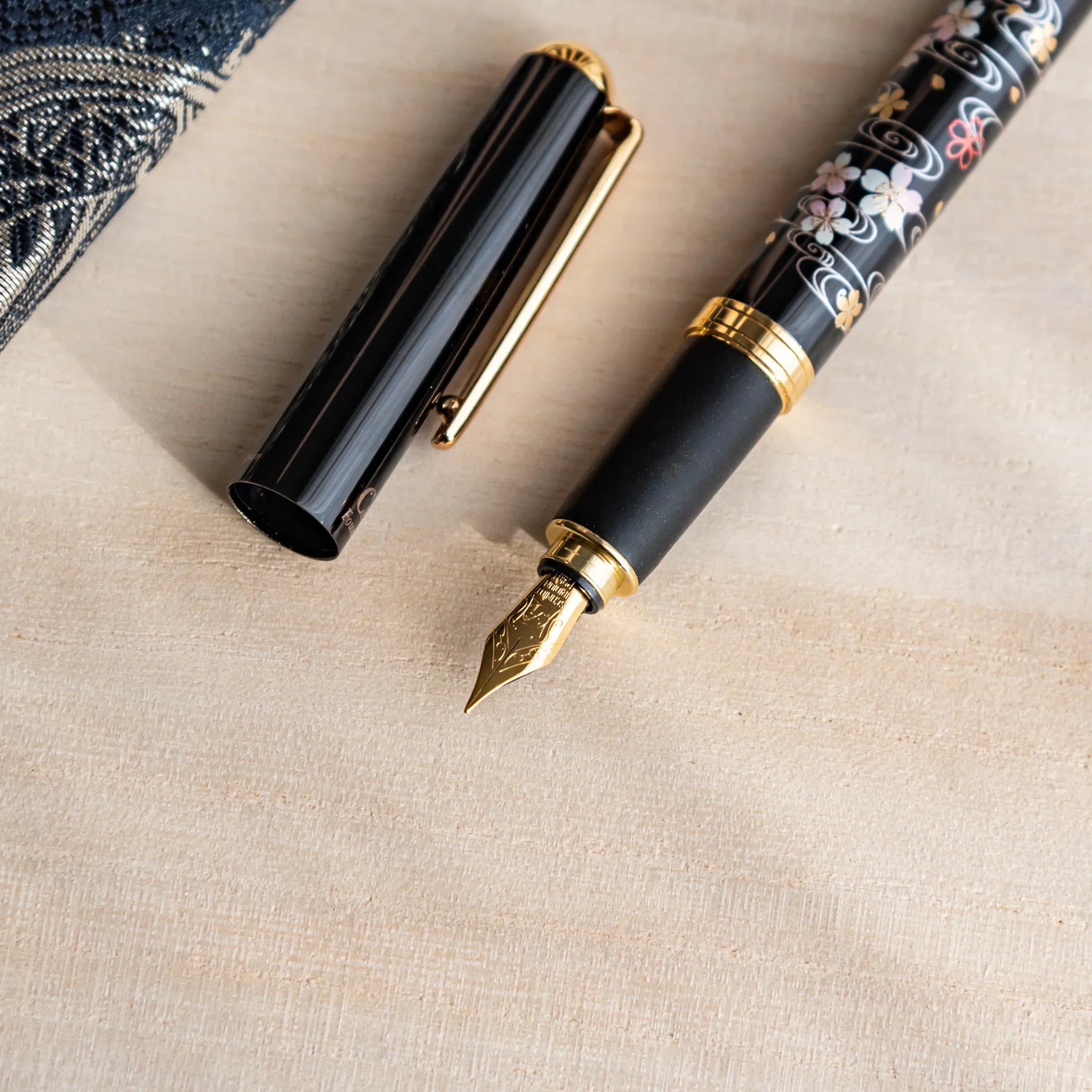 Sakura over the River Yamanaka Fountain Pen, side profile view of product providing full visual representation and product de