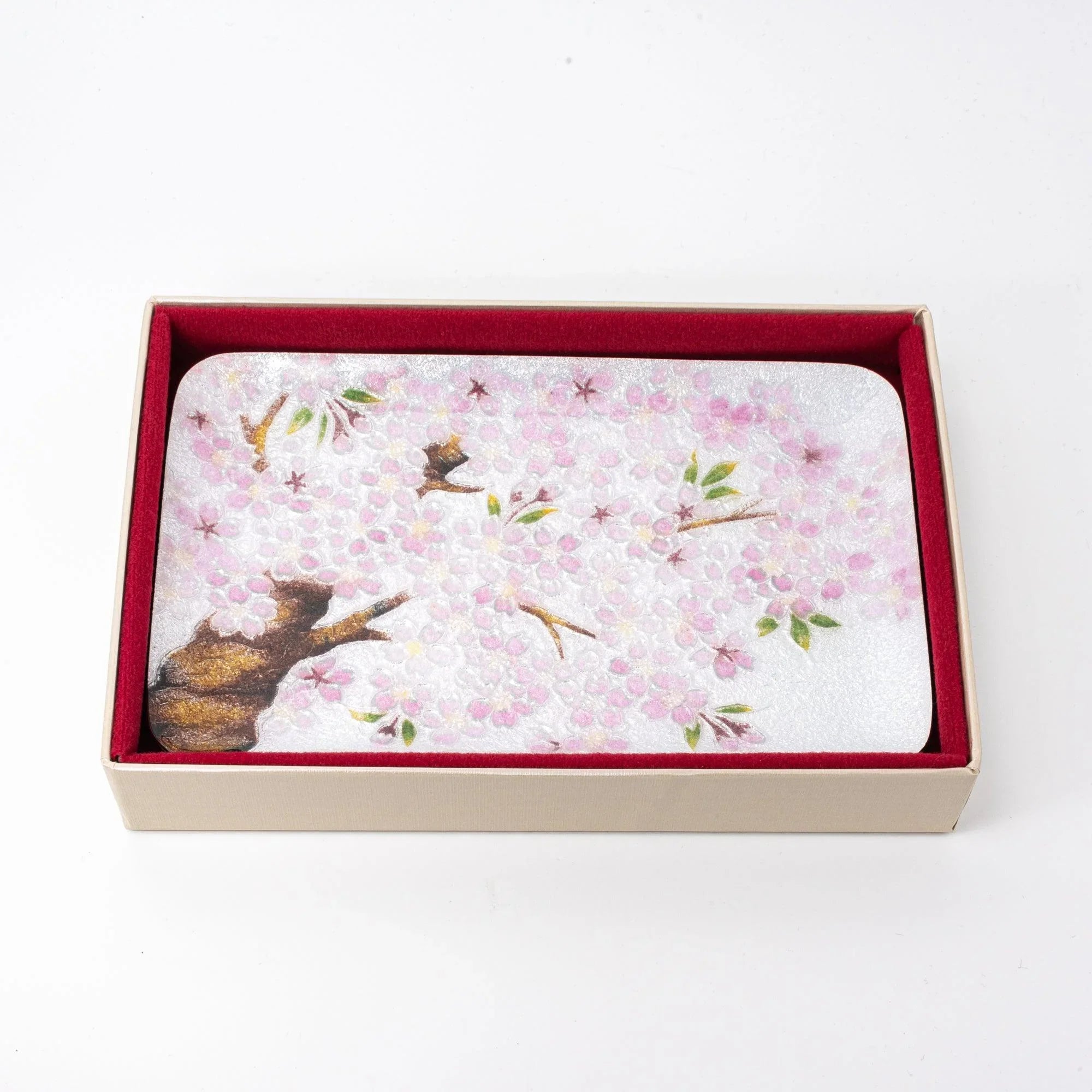Sakura shippo ware silver pen tray inside cream gift box with red velvet lining, showing full sakura blossom design