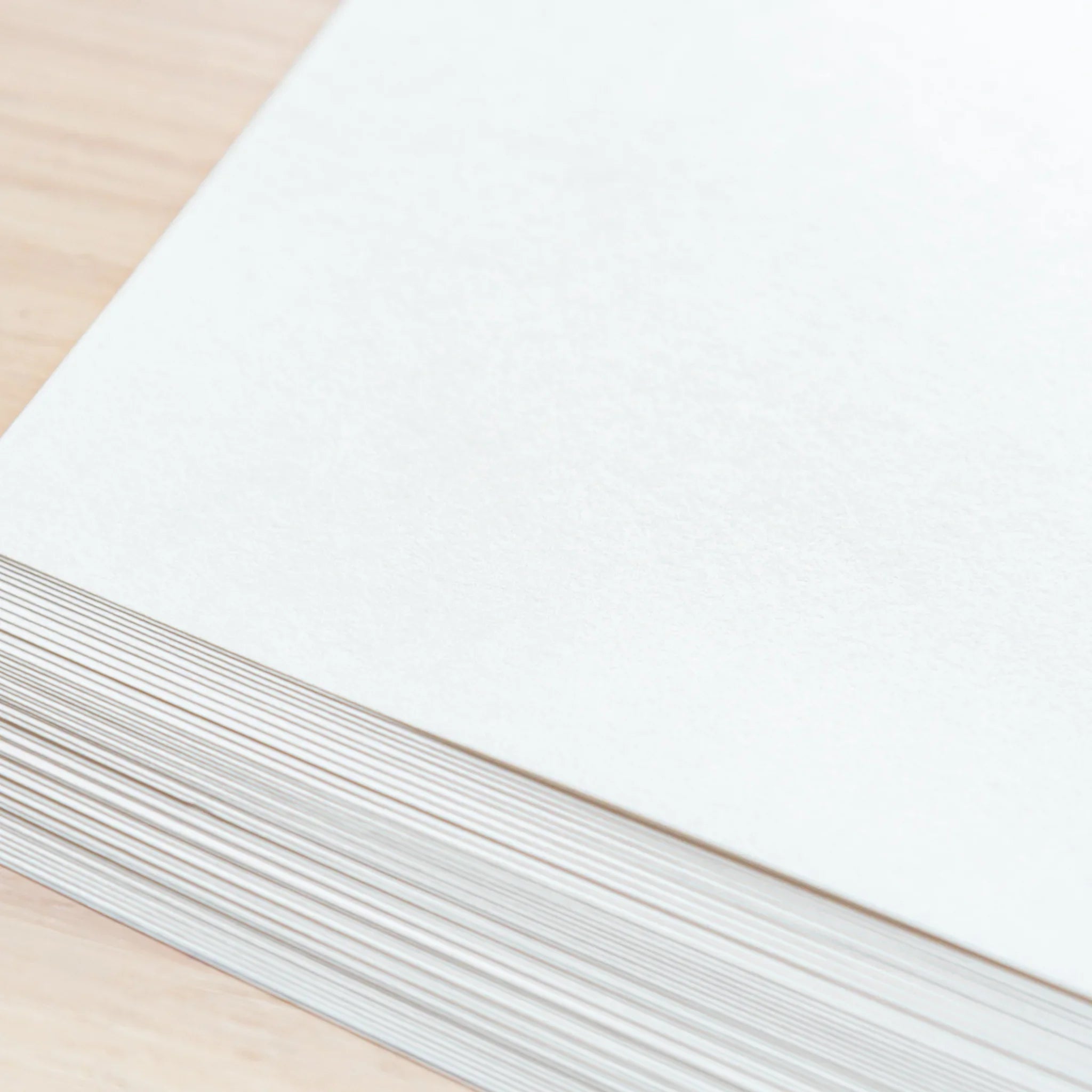Writing samples on Sheep Clouds Bond paper demonstrating pen compatibility and cloud pattern visibility on sheet