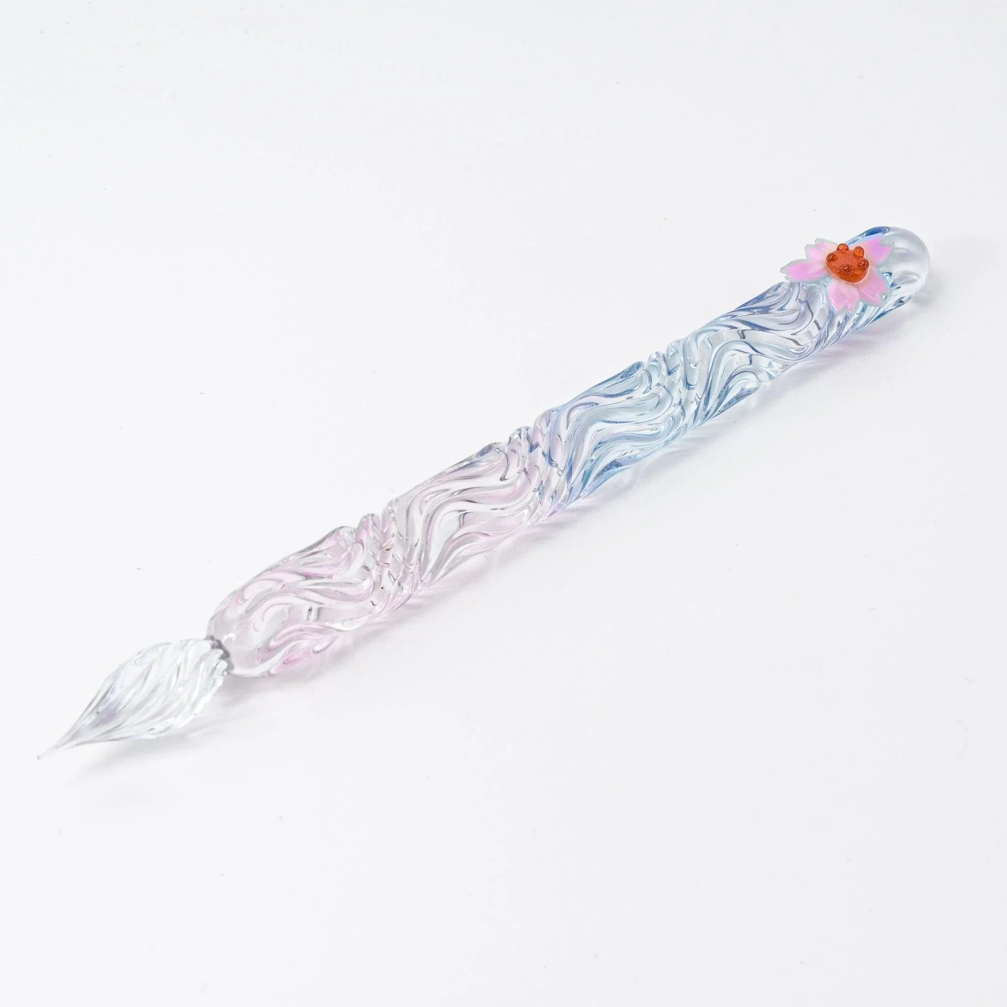 Pink sakura glass dip pen with hand-twisted fine glass nib detail showing traditional Japanese glass craftsmanship