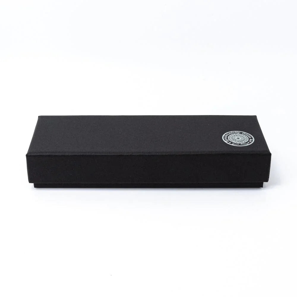 Smoke in Verdure glass dip pen box interior showing open lid view from above on white product background