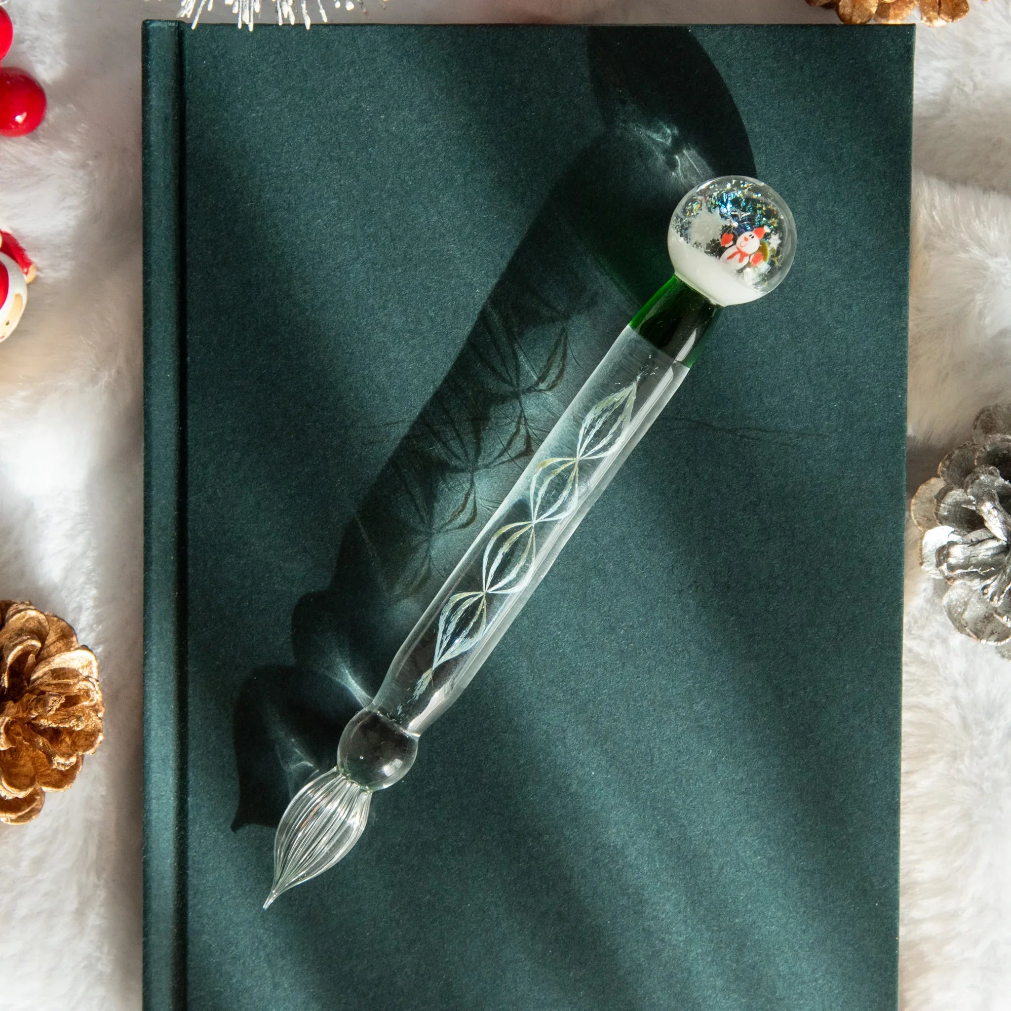 Snow Globe glass dip pen displaying white snow sparkle effect inside clear transparent barrel with design shine