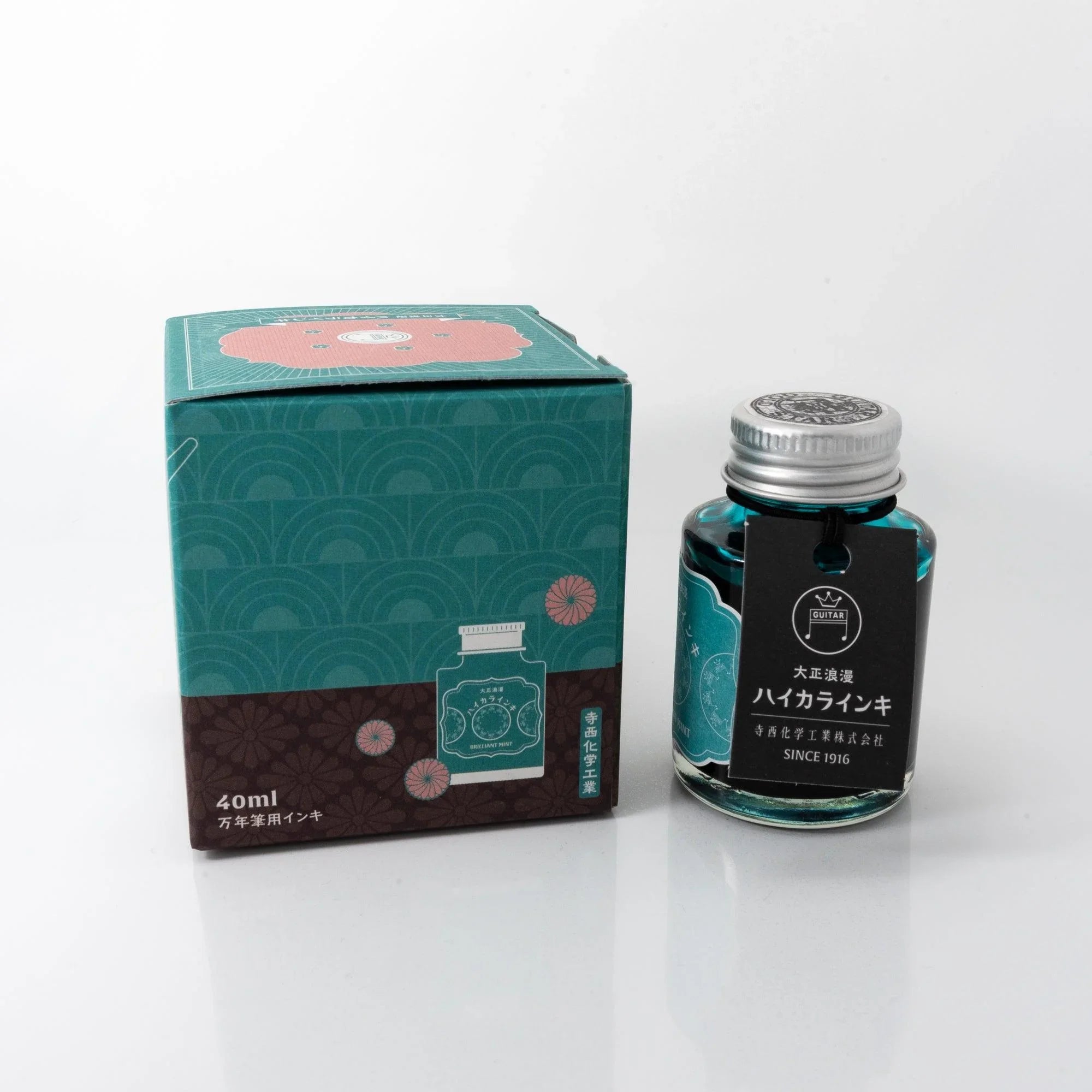 Handwritten flowing text demonstration written gracefully with Taisho Romance Brilliant Mint ink sample