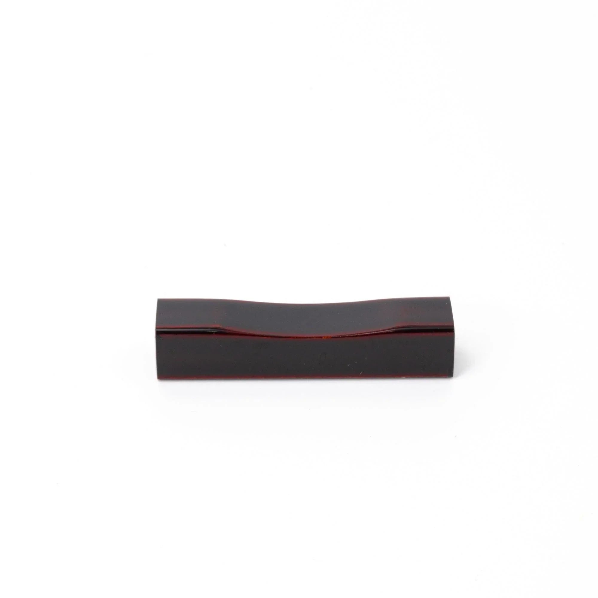Echizen Tame-Nuri black lacquer pen rest from sakura wood with aged aesthetic finish, keeping pens secure during work