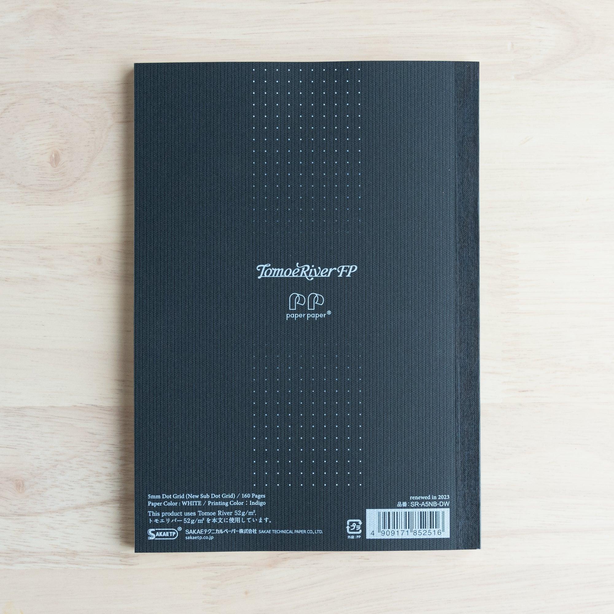 Tomoe River FP A5 soft cover 160-page notebook, flat lay of closed journal on neutral white background