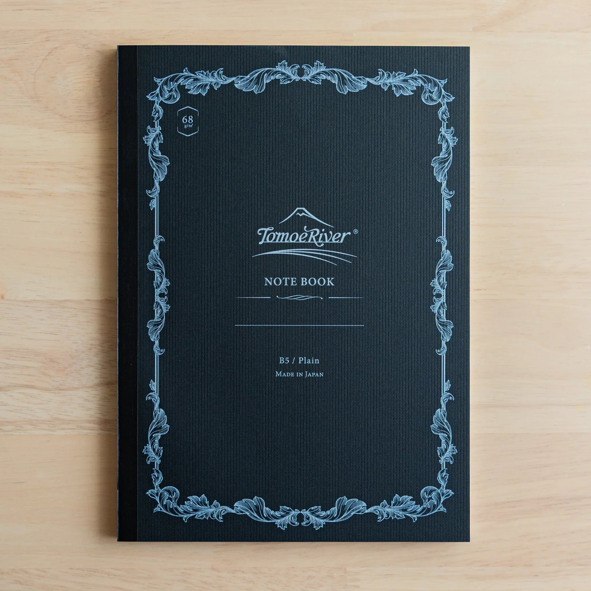 Sanzen Tomoe River FP notebook B5 soft cover with navy textured surface and ornamental border design