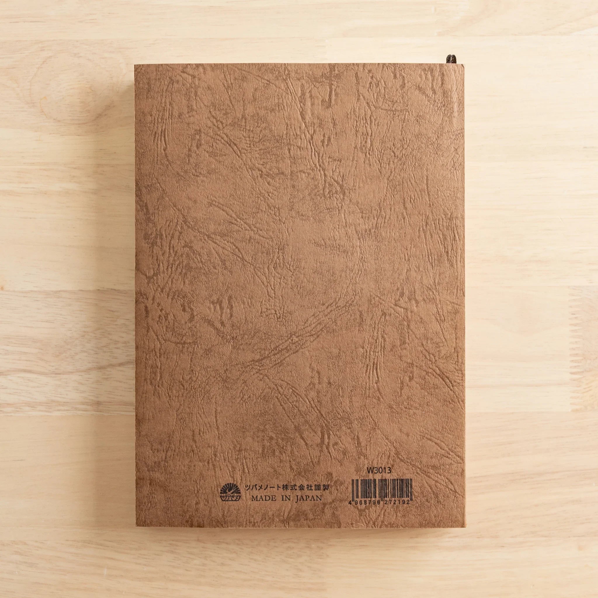 Tsubame Fools Premium Thick Notebook closed product view tan textured hardcover complete notebook design
