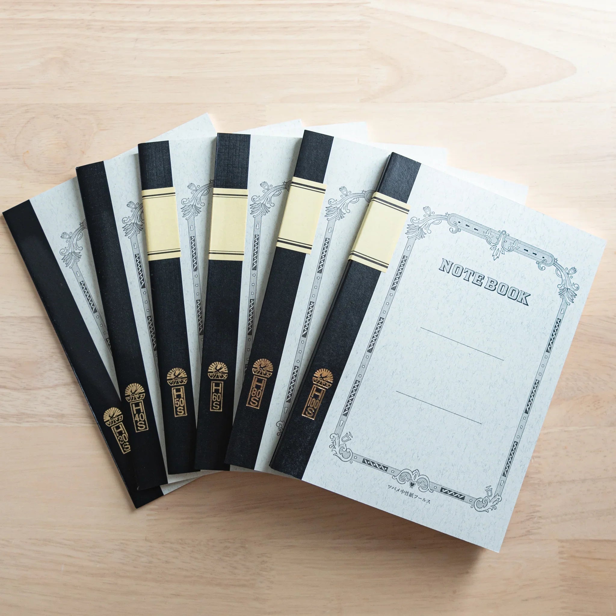 Tsubame Fools University Notebook cream hardcover showing edge detail with ruled pages Japanese college style