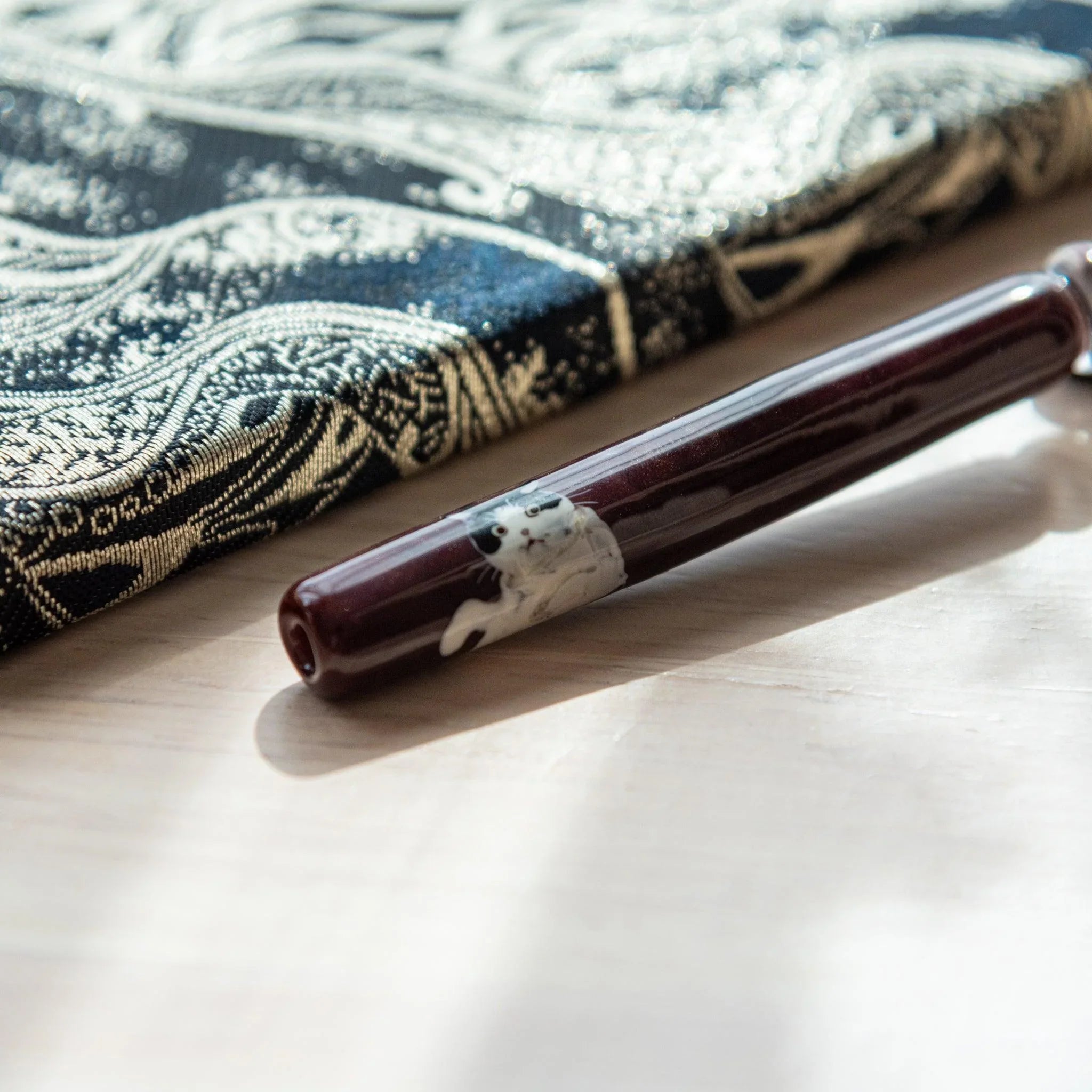 Tuxedo Cat Glass Dip Pen with Pen Rest aerial view showing complete pen with kawaii cat design on transparent glass